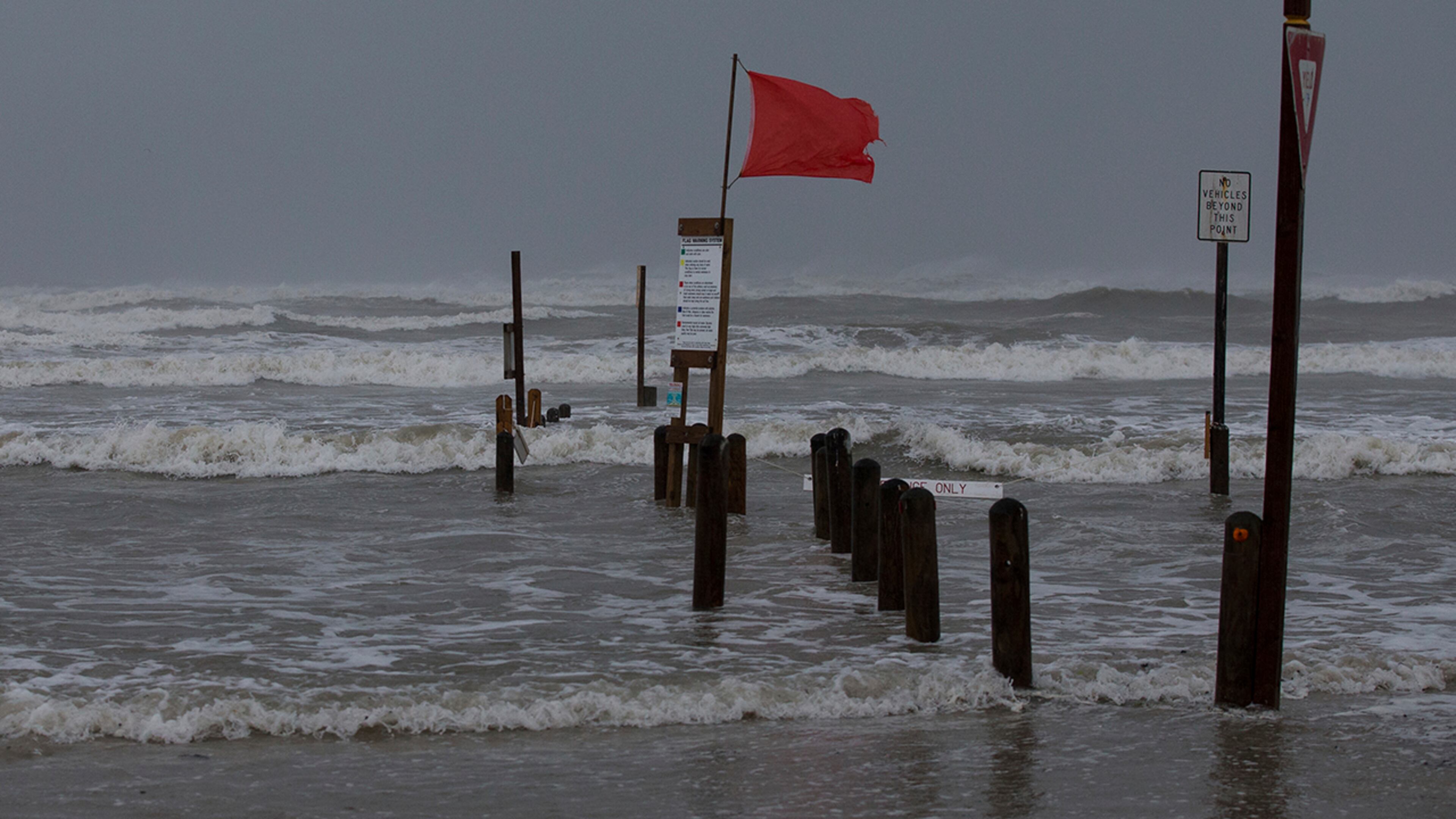 Water rises at Bob Hall Pier in Corpus Christi, Texas as Hurricane Harvey approaches on Friday, Aug. 25, 2017. The slow-moving hurricane could be the fiercest such storm to hit the United States in almost a dozen years. Forecasters labeled Harvey a "life-threatening storm" that posed a "grave risk" as millions of people braced for a prolonged battering. (Courtney Sacco/Corpus Christi Caller-Times via AP)