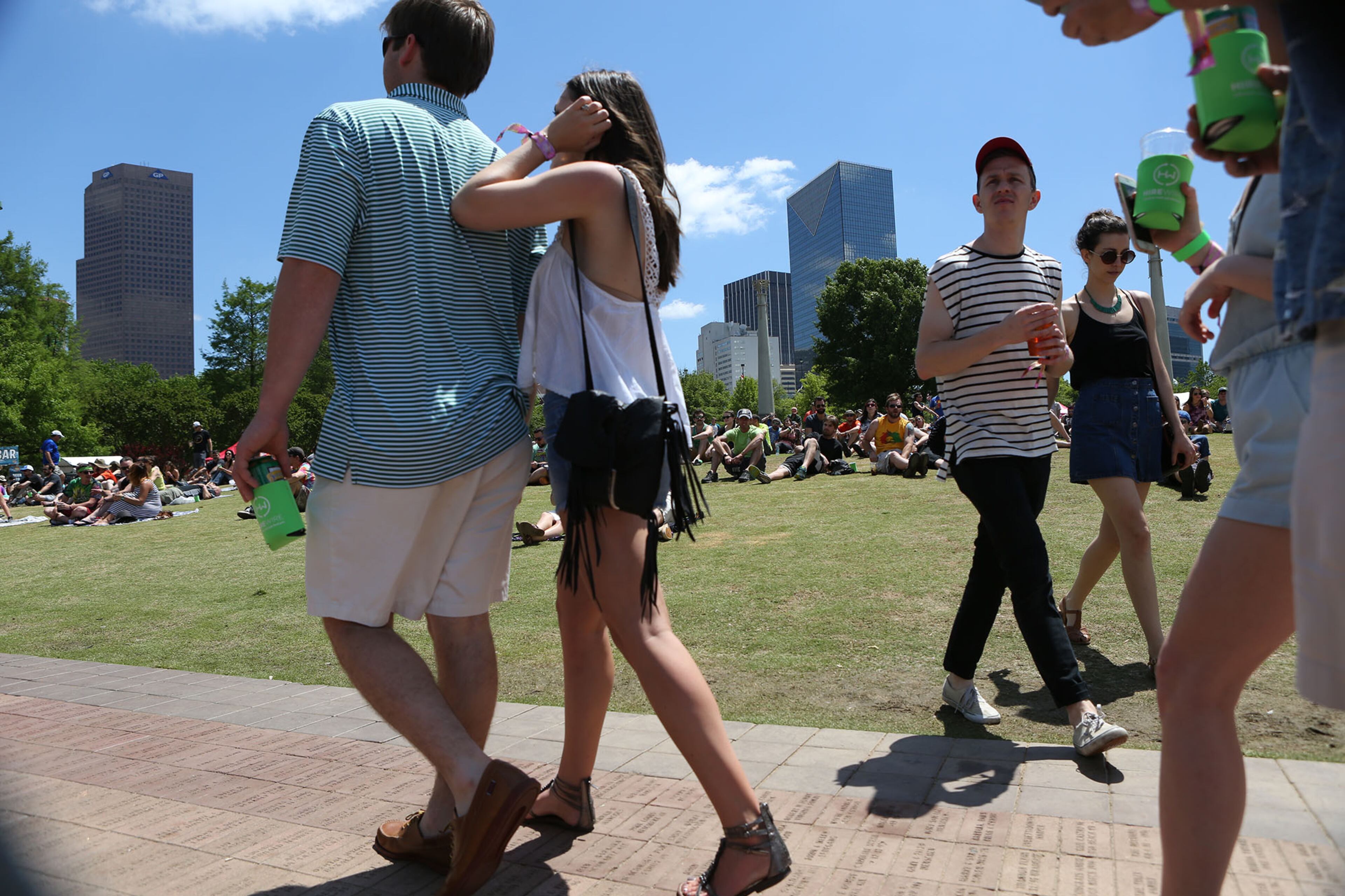 People strolling the grounds of Centennial Olympic Park during SweetWater 420 Fest on Saturday, April 23, 2016 in Atlanta, Ga. (Akili-Casundria Ramsess/Special to the AJC)