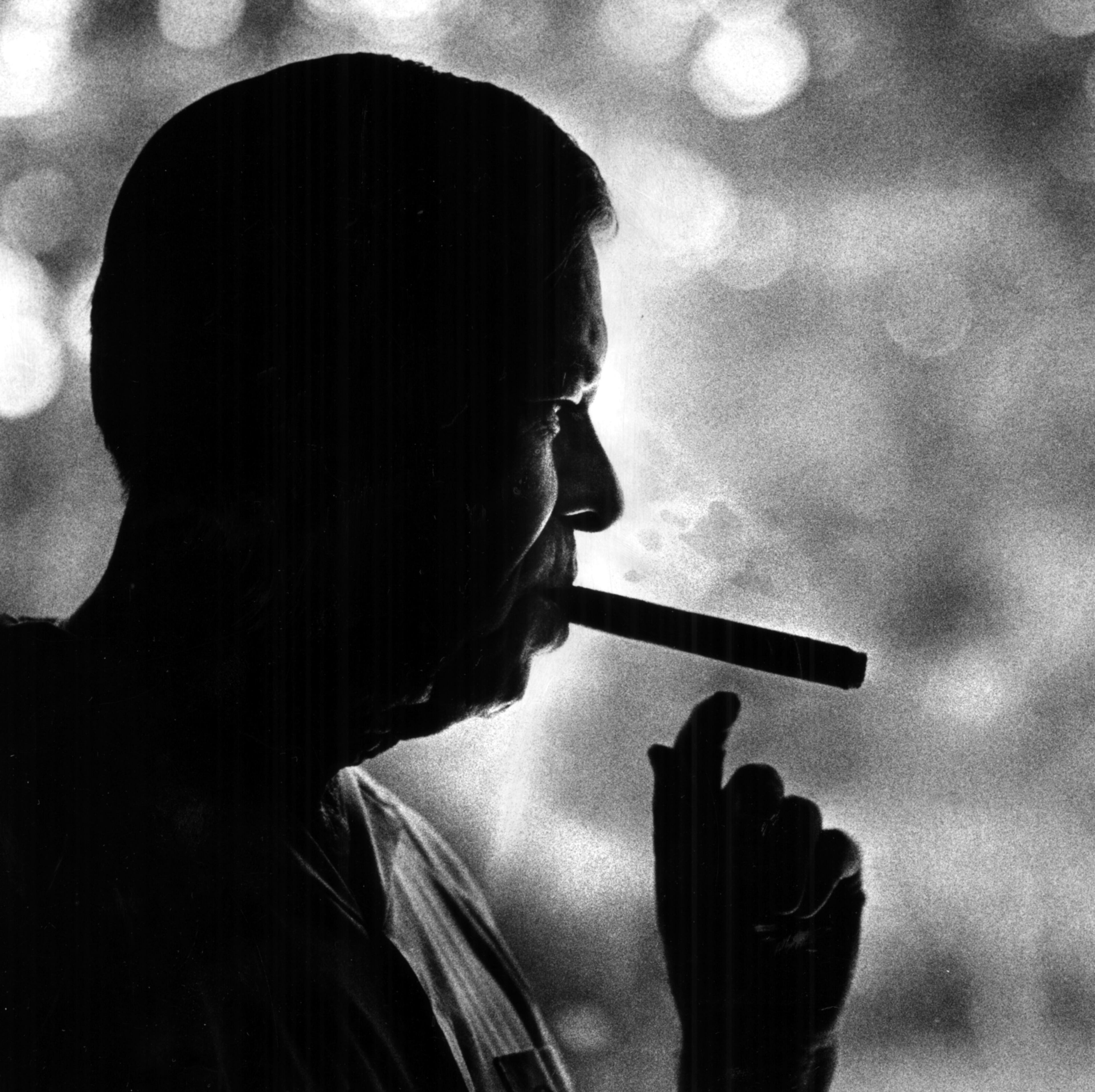 April 14, 1985 - Former U.S. Senator Herman Talmadge might be reflecting on his political past as he puffs on his huge ever-present cigar. (Calvin Cruce/AJC staff) 1985