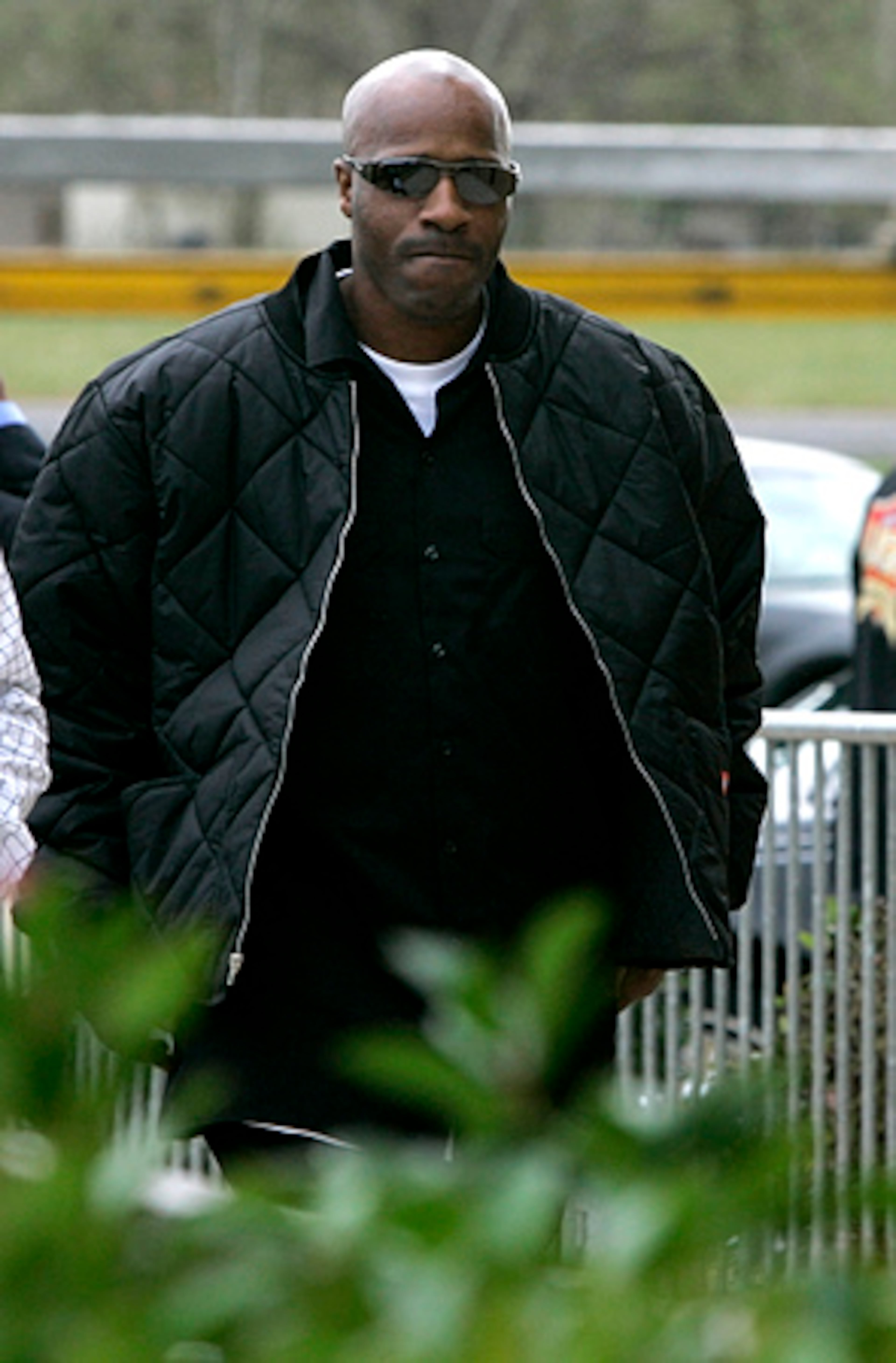 Performer Willie D arrives at the service. Officials have said that there was no foul play surrounding Pimp C's death