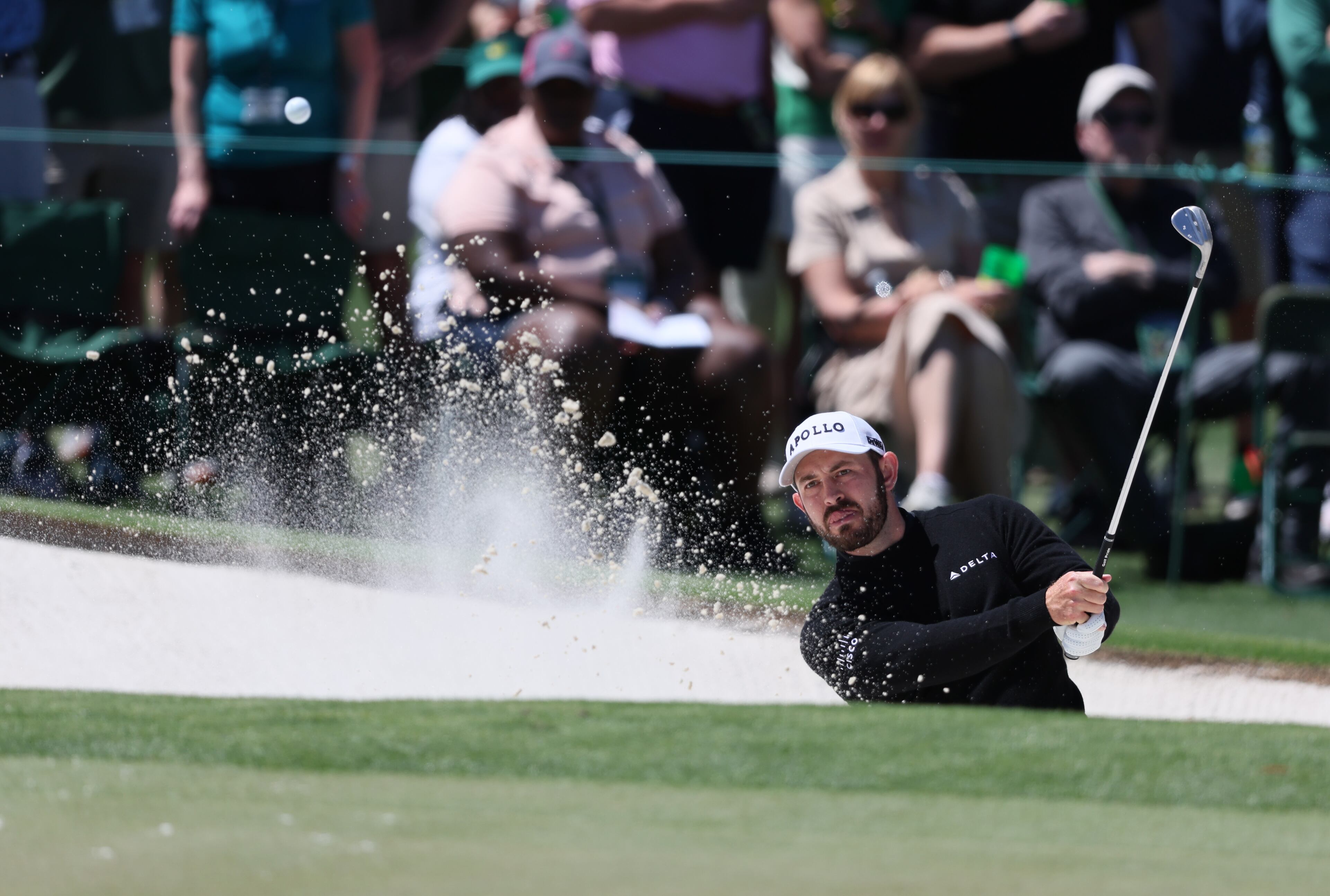 Patrick Cantlay hits out of bunker on second hole during third round at the 2024 Masters Tournament at Augusta National Golf Club, Saturday, April 13, 2024, in Augusta, Ga. Jason Getz / Jason.Getz@ajc.com)