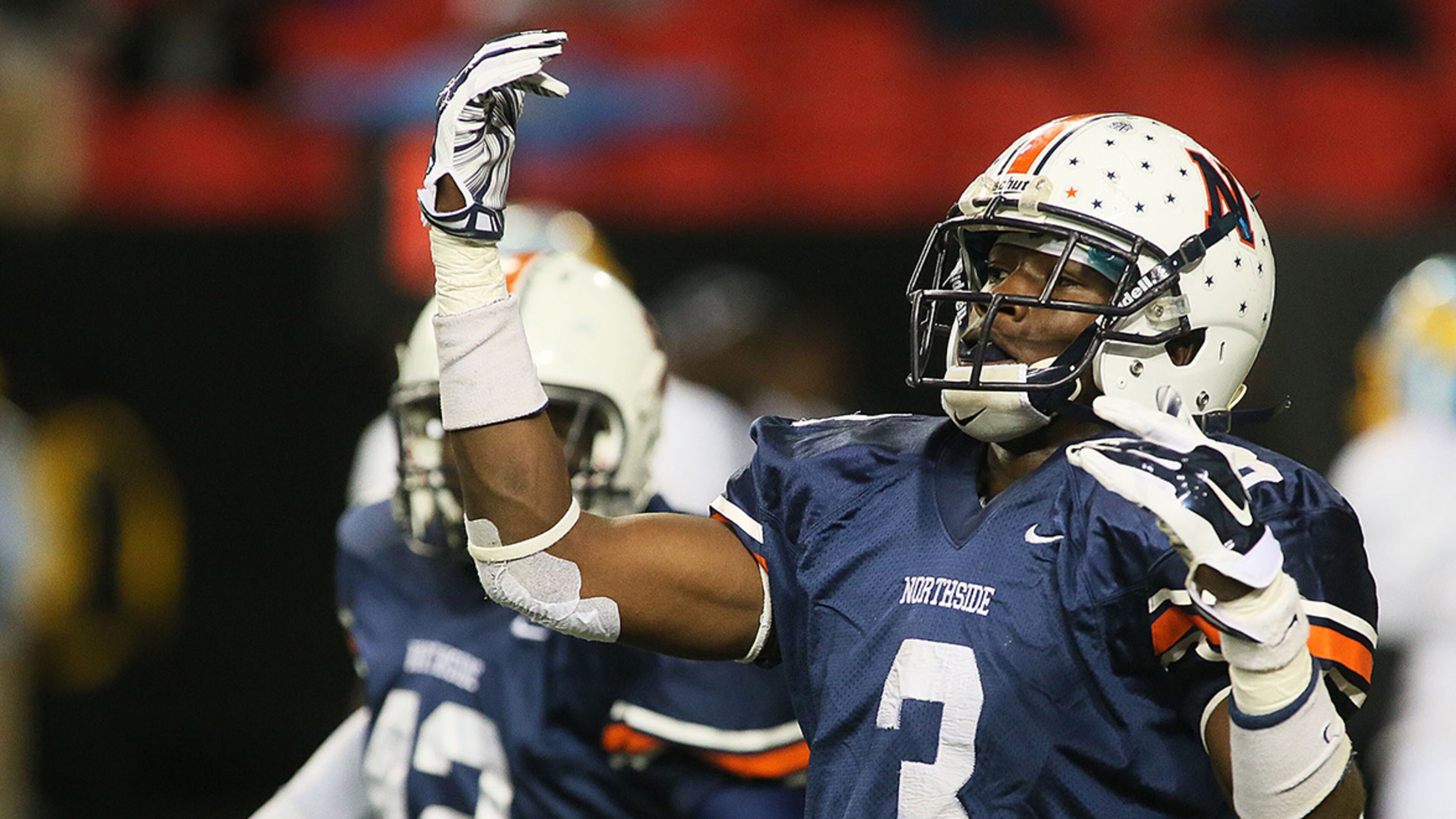 December 12, 2014-ATLANTA:Northside-Warner Robbins #3 Tanner Smith celebrates after he blocked a field gold in the first half against Mays in their Georgia High School Association AAAAA Football state championship game at the Georgia Dome on Friday December 12th, 2014. (Photo by Phil Skinner)