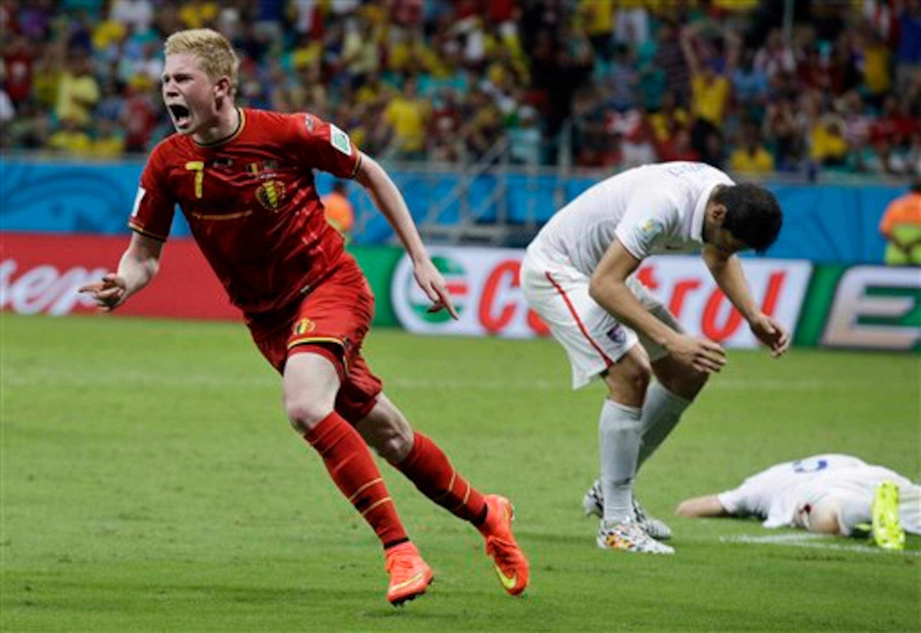 Belgium's Kevin De Bruyne celebrates after scoring the opening goal during the World Cup round of 16 soccer match between Belgium and the USA at the Arena Fonte Nova in Salvador, Brazil, Tuesday, July 1, 2014. (AP Photo/Matt Dunham)