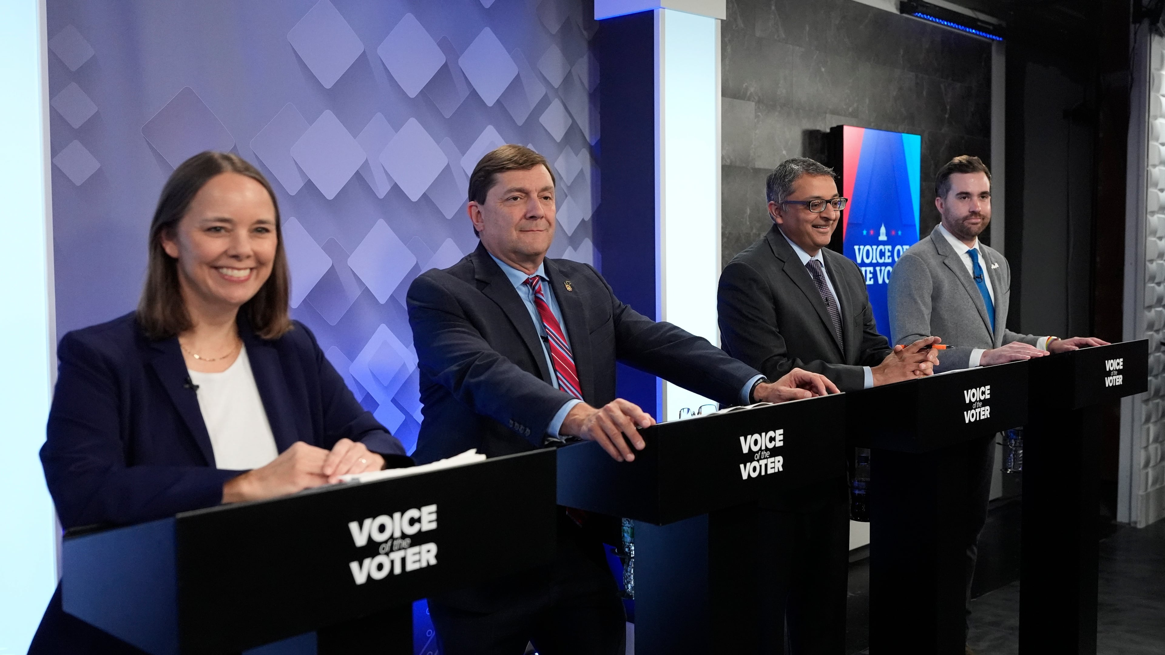 From left, U.S. Senate candidates Shenna Bellows, Troy Jackson, Dr. Nirav Shah, and Jordan Wood prepare for their televised debate at the WCSH-6 studio Thursday, July 16, 2026, in Portland, Maine. (AP Photo/Robert F. Bukaty)
