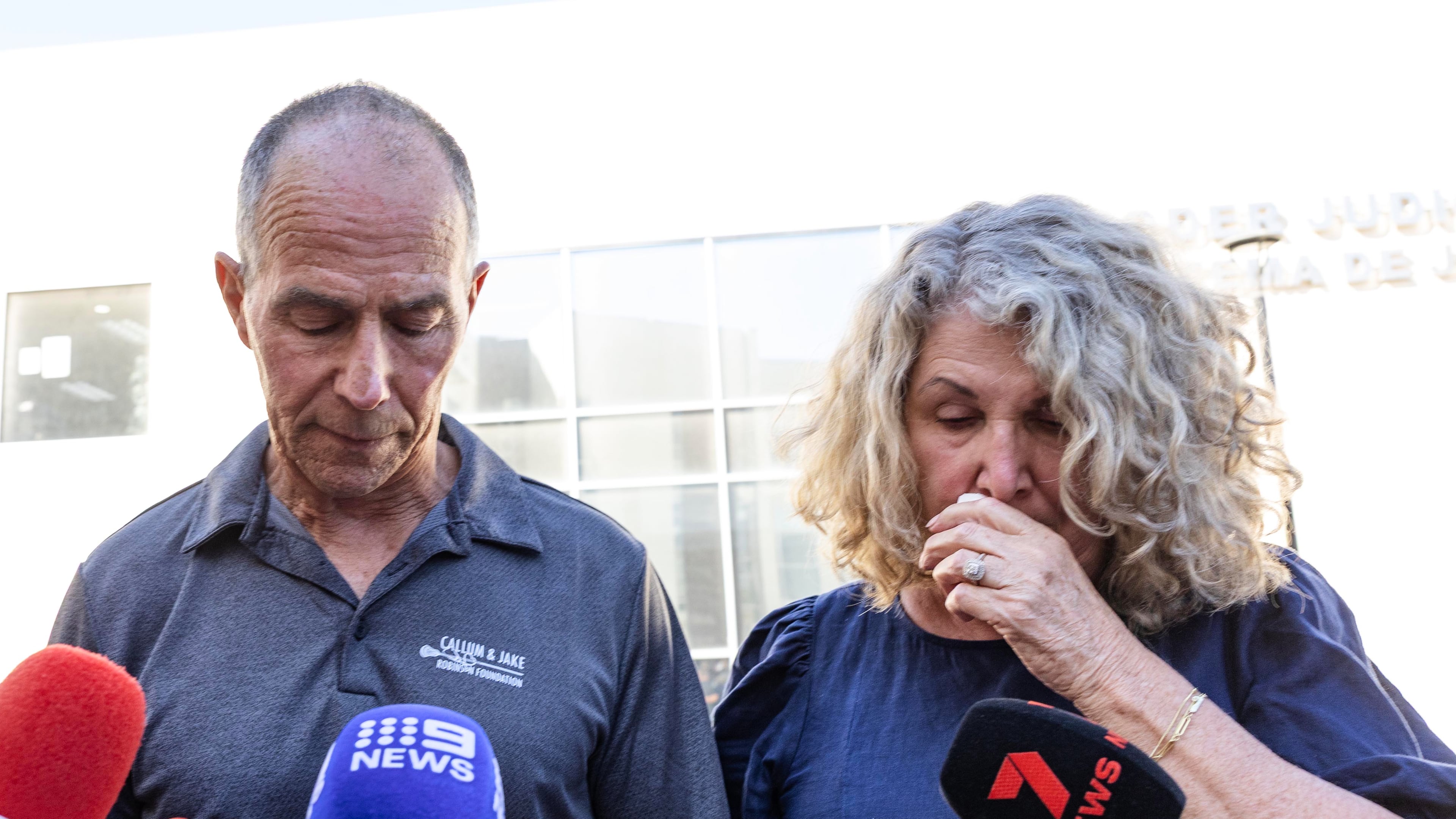 Debra and Martin Robinson, parents of Australian brothers Callum and Jake Robinson, pause during a news conference after the trial of the men accused of murdering the brothers and an American friend, in Ensenada, Mexico, Friday, Oct. 9, 2026. (AP Photo/Karen Castaneda)