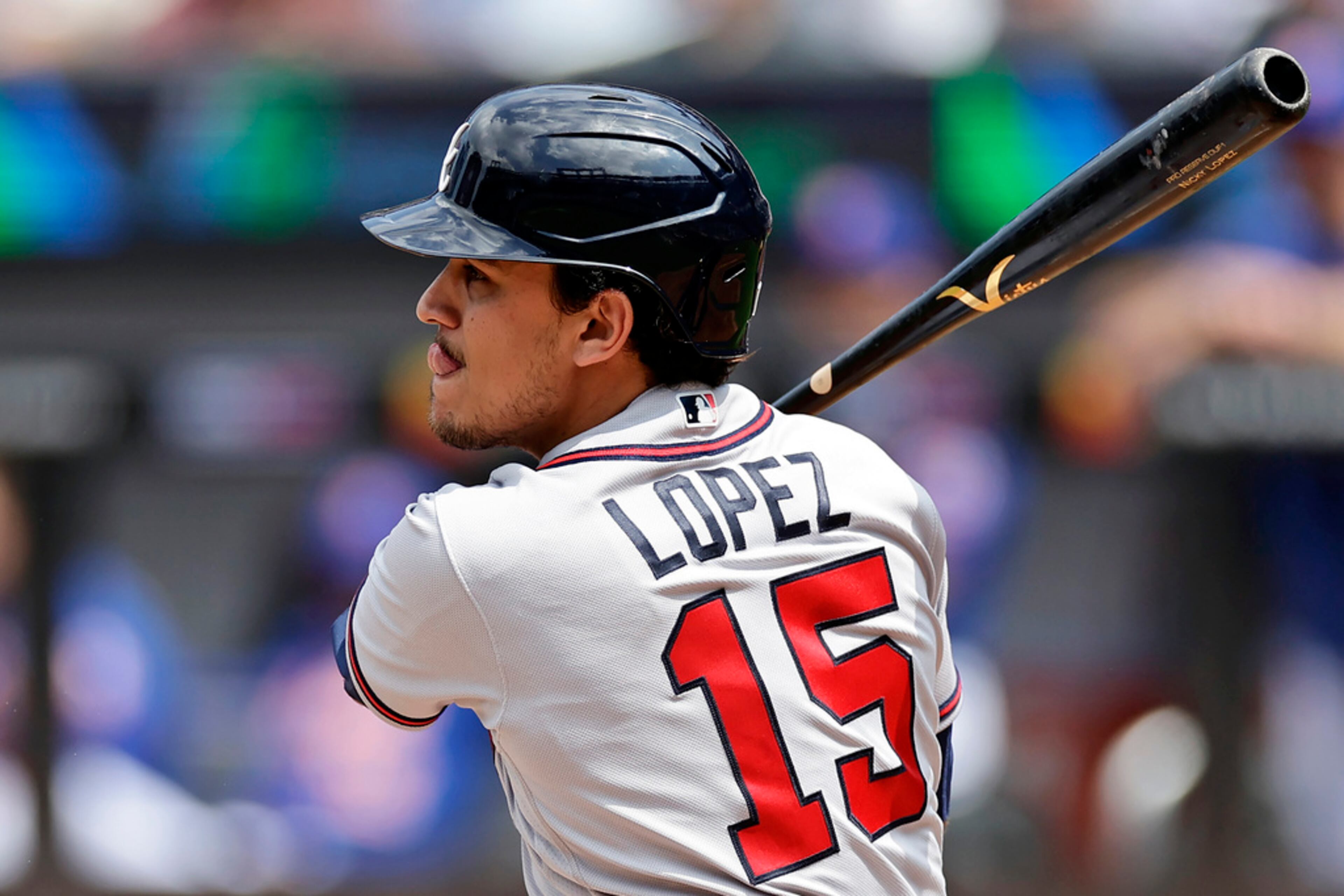 Atlanta Braves' Nicky Lopez hits a run scoring double against the New York Mets during the second inning in the first baseball game of a doubleheader on Saturday, Aug. 12, 2023, in New York. (AP Photo/Adam Hunger)