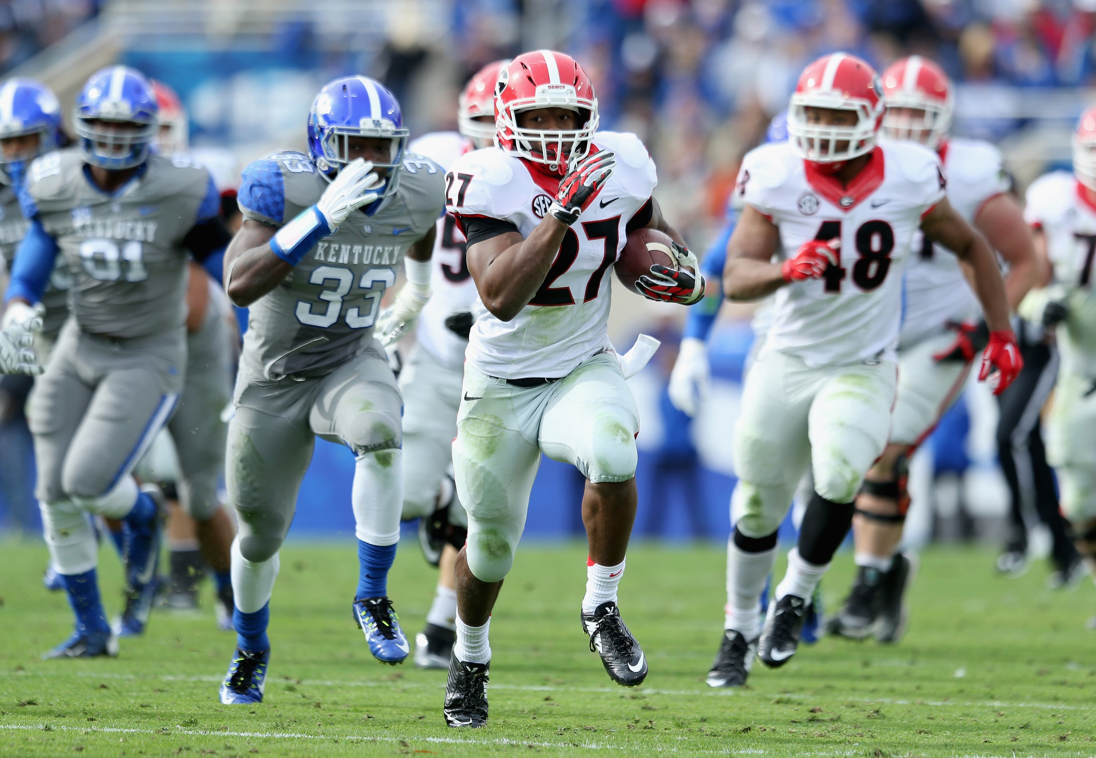 LEXINGTON, KY - NOVEMBER 08: Nick Chubb #27 of the Georgia Bulldogs runs with the ball during the game against the Kentucky Wildcats at Commonwealth Stadium on November 8, 2014 in Lexington, Kentucky. (Photo by Andy Lyons/Getty Images)