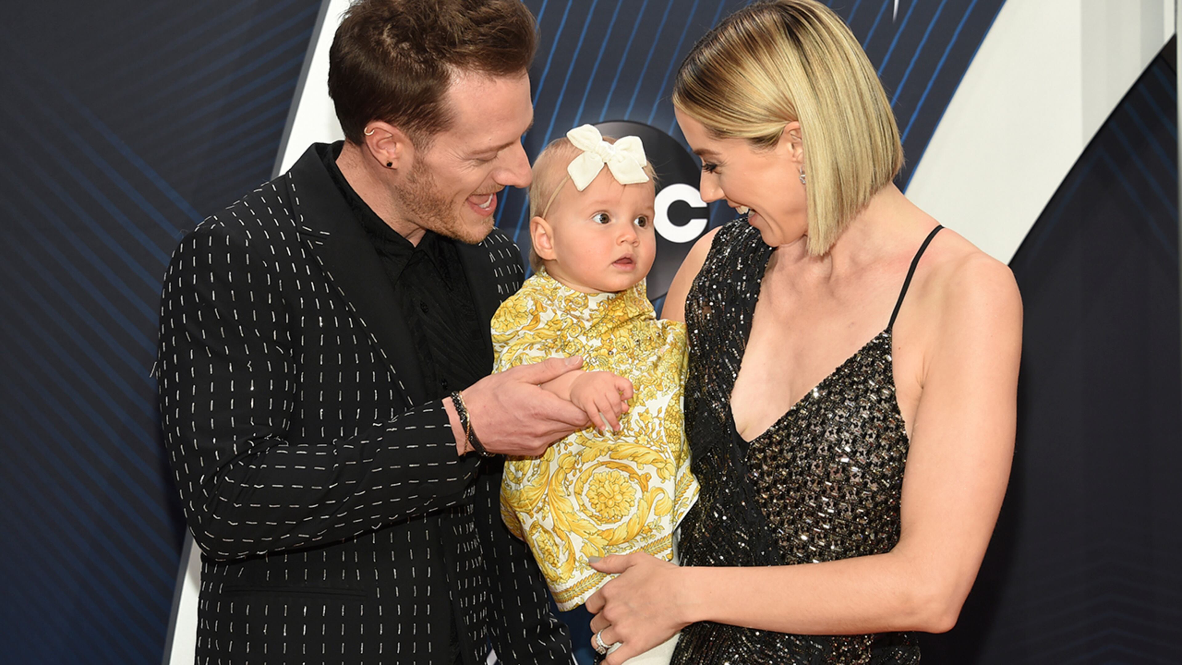 Tyler Hubbard of Florida Georgia Line, from left, Olivia Rose Hubbard and Hayley Hubbard arrive at the 52nd annual CMA Awards at Bridgestone Arena on Wednesday, Nov. 14, 2018, in Nashville, Tenn. (Photo by Evan Agostini/Invision/AP)
