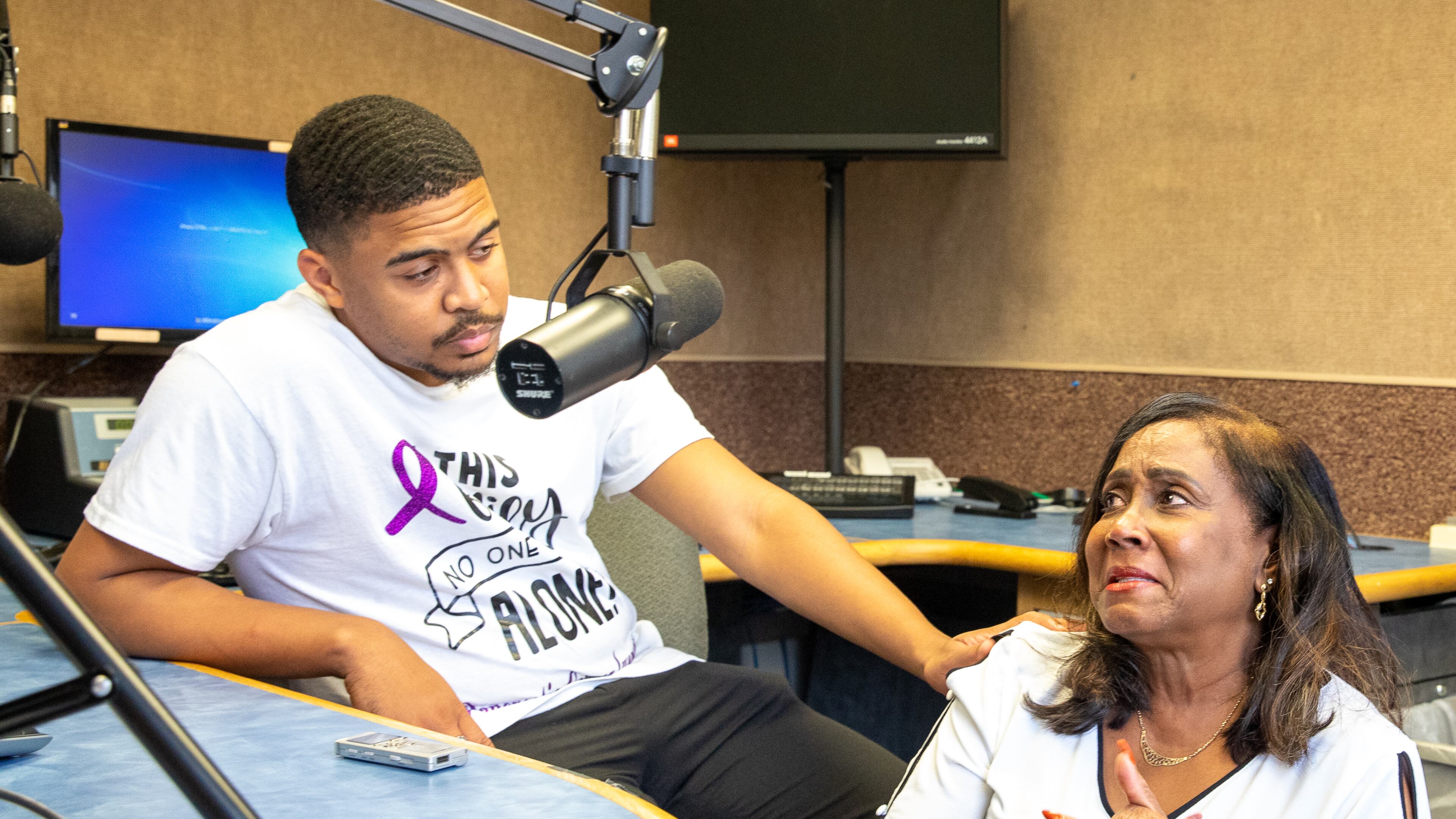 Silas Alexander and Sandra Alexander, the son and wife of late radio personality SiMan, are seen in the studio at 1380 WAOK in Midtown on Monday, Aug. 15, 2022. (Jenni Girtman for The Atlanta Journal-Constitution)