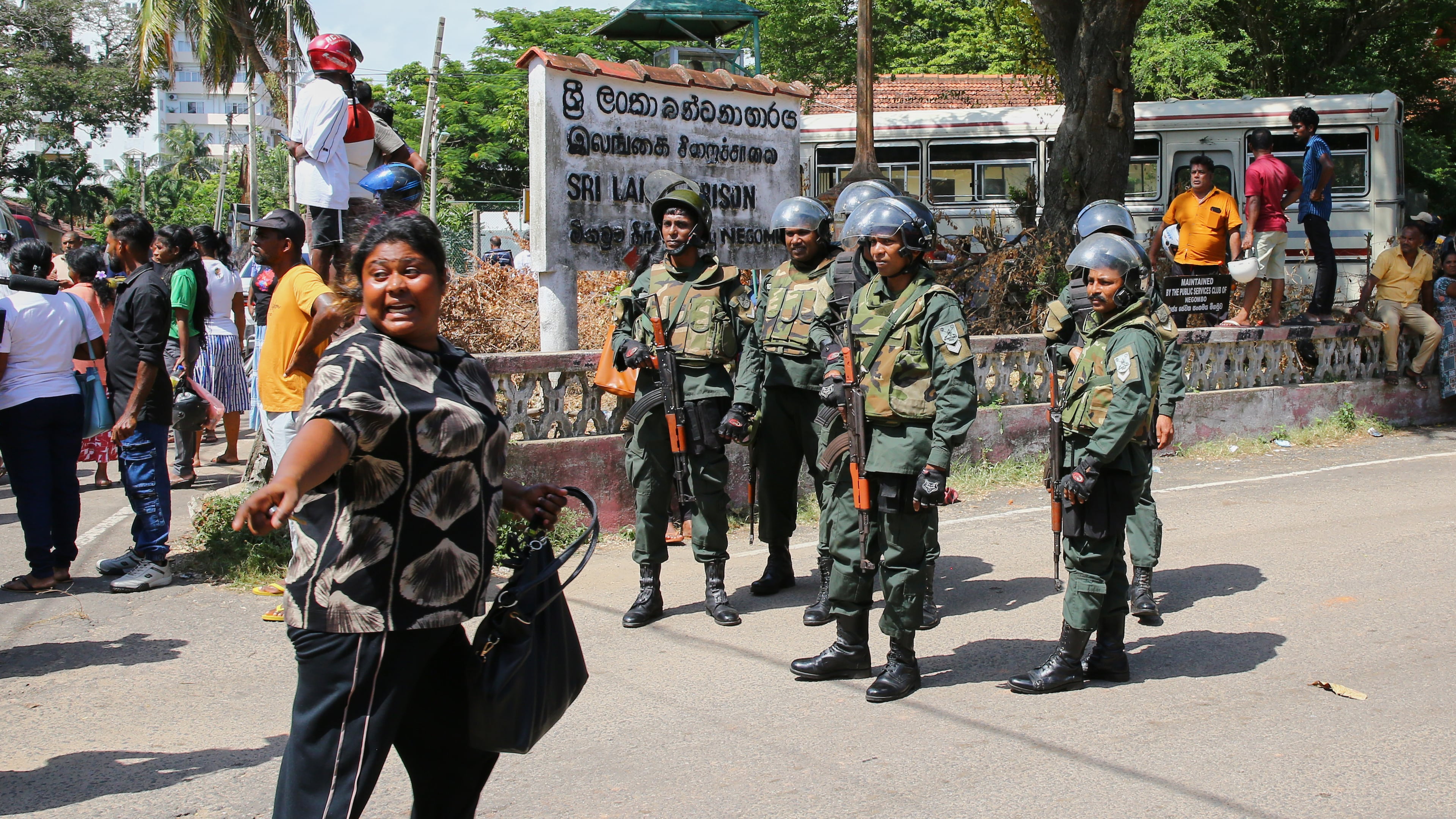 Security personnel stand guard outside a prison where deadly clashes broke out on Sunday, in Negombo, 35 kilometers (22 miles) north of the capital Colombo, Sri Lanka, Monday, July 6, 2026. (AP Photo)