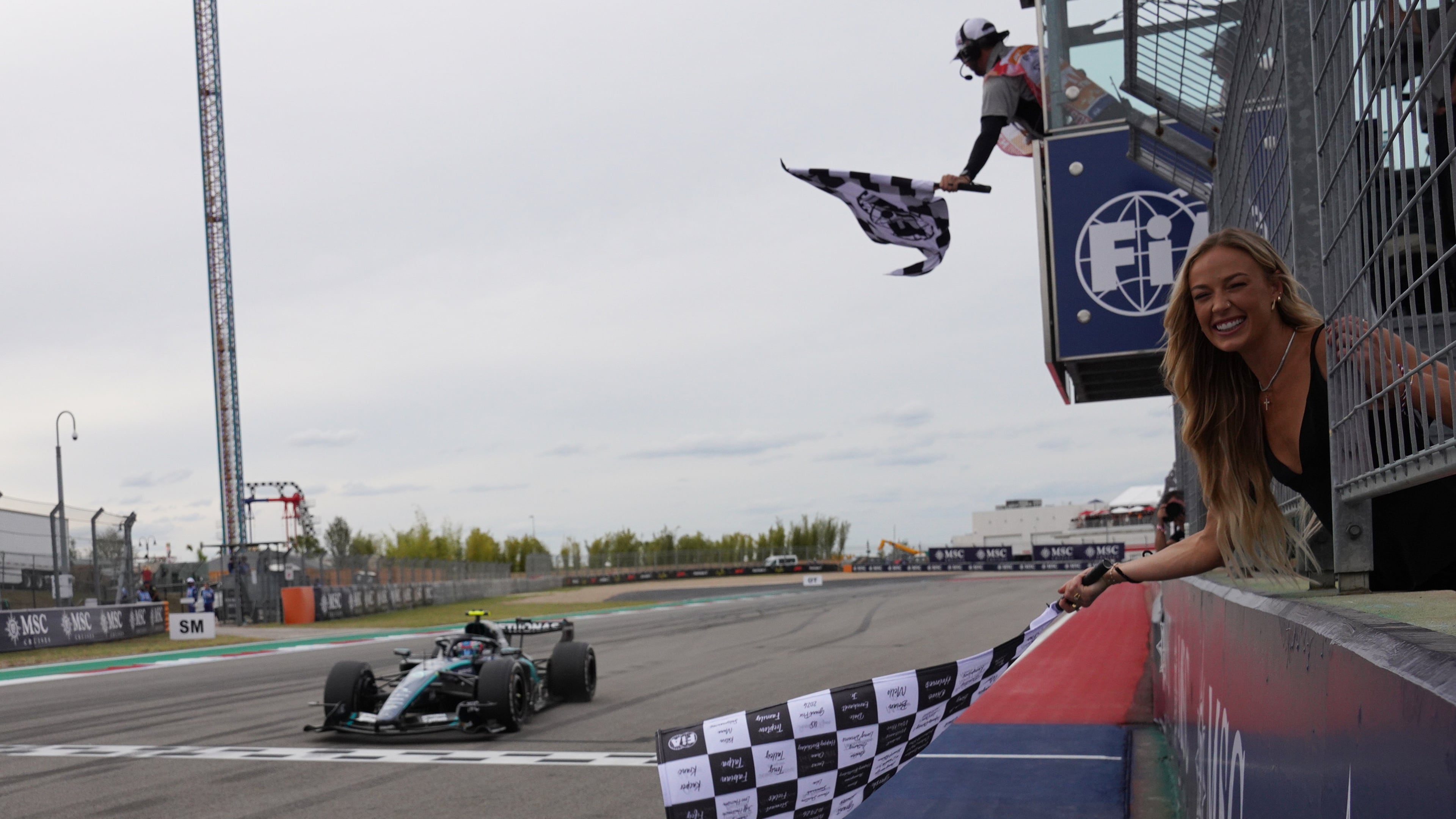 Mercedes driver Andrea Kimi Antonelli of Italy crosses the finish line to win the Formula One U.S. Grand Prix auto race in Austin, Texas, Sunday, Oct. 25, 2026. (Dustin Safranek/Pool Photo via AP)