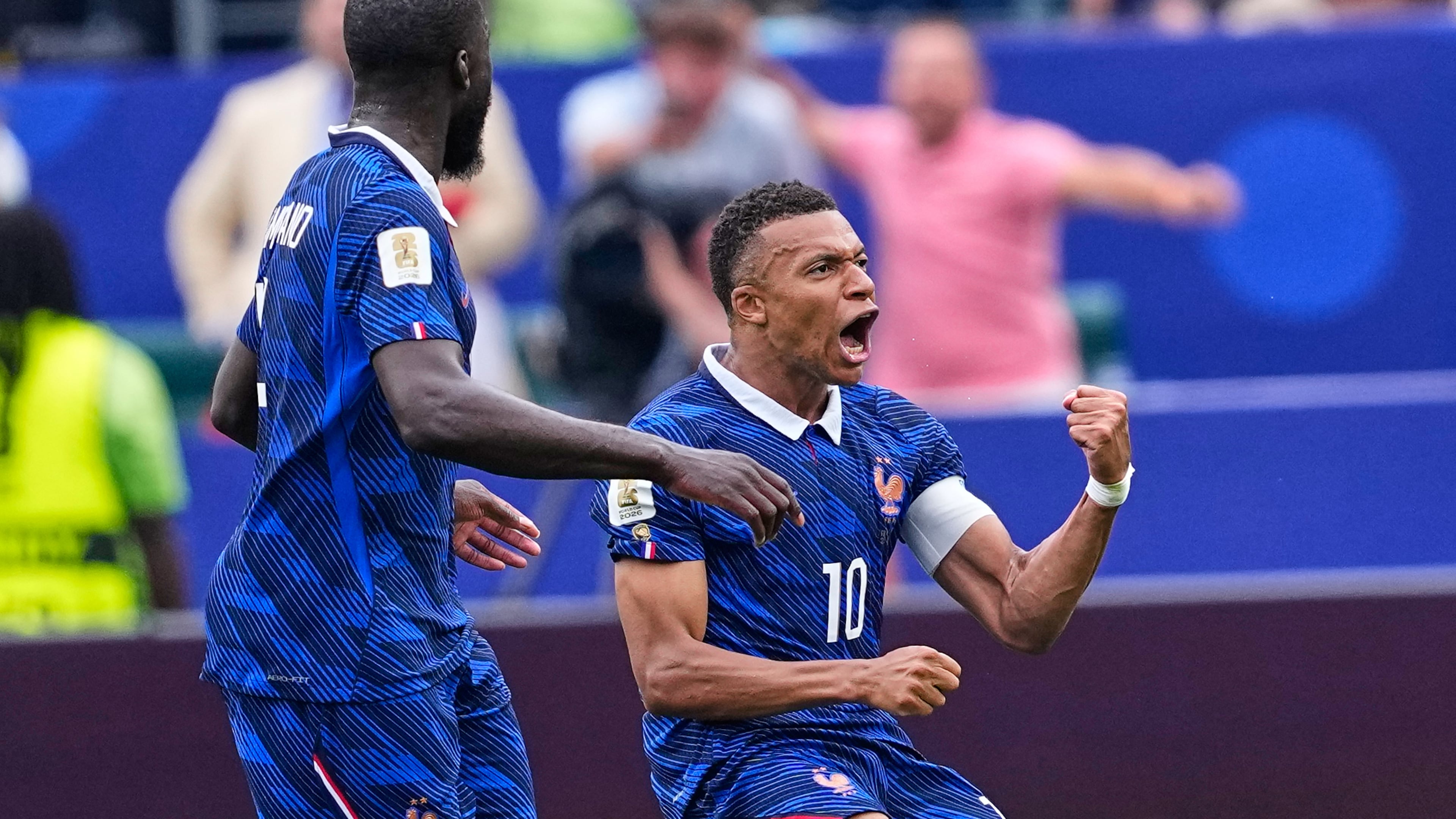 France's Kylian Mbappe (10) celebrates after scoring his team's first goal during the World Cup Group I soccer match between France and Iraq in Philadelphia, Monday, June 22, 2026. (AP Photo/Petr David Josek)