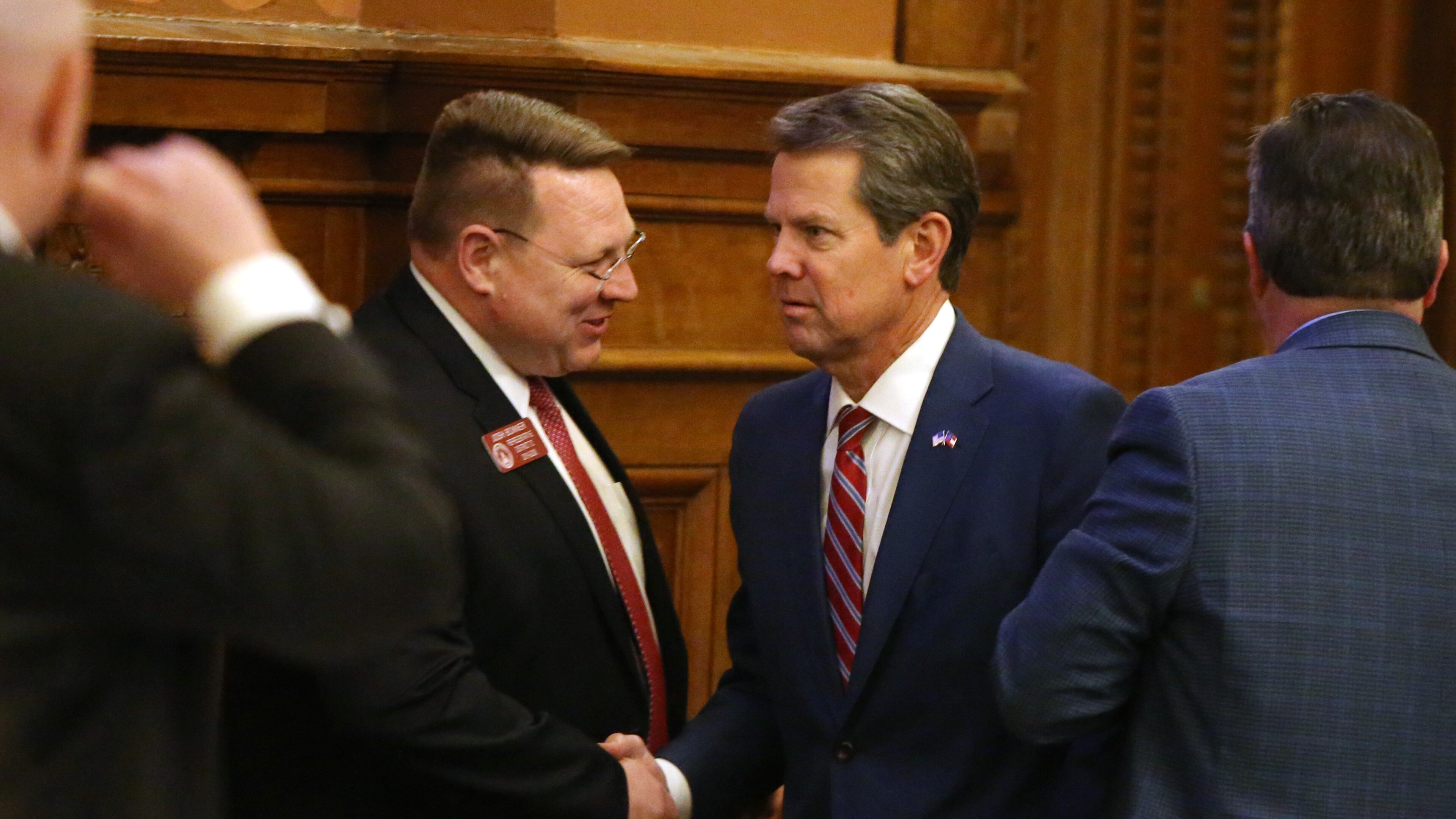 Gov. Brian Kemp shakes the hand of Rep. Josh Bonner as he leaves the House of Representatives at the Georgia State Capitol in Atlanta on Tuesday, April 2, 2019. The Kemp ally shepherded a Kemp priority - a parents' bill of rights - through the Legislature this year, with final passage on Friday, April 1, 2022. (Emily Haney / AJC file photo)