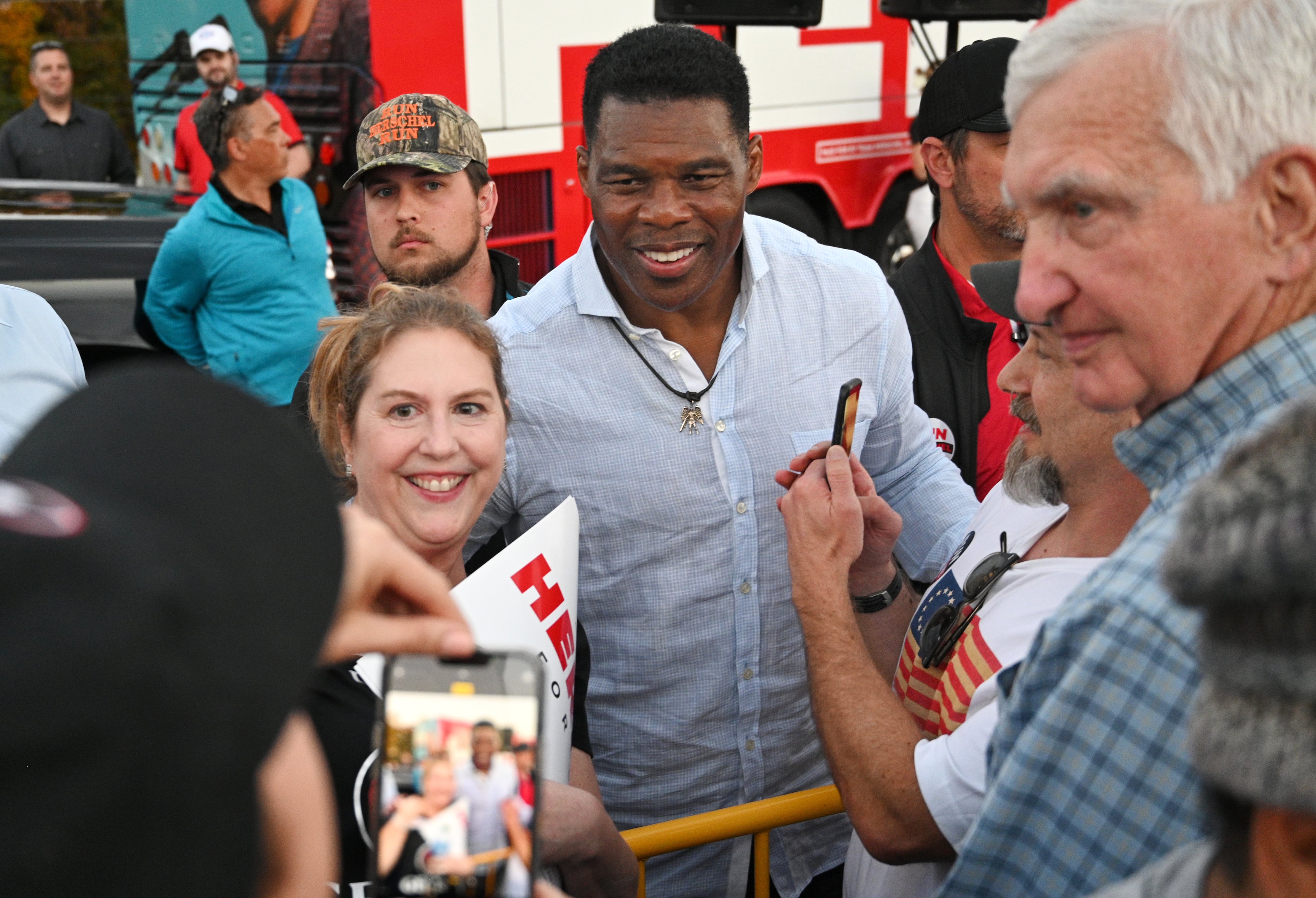 Then-Republican U.S. Senate hopeful Herschel Walker greets his supporters during a 2022 rally in Smyrna. (Hyosub Shin/AJC)