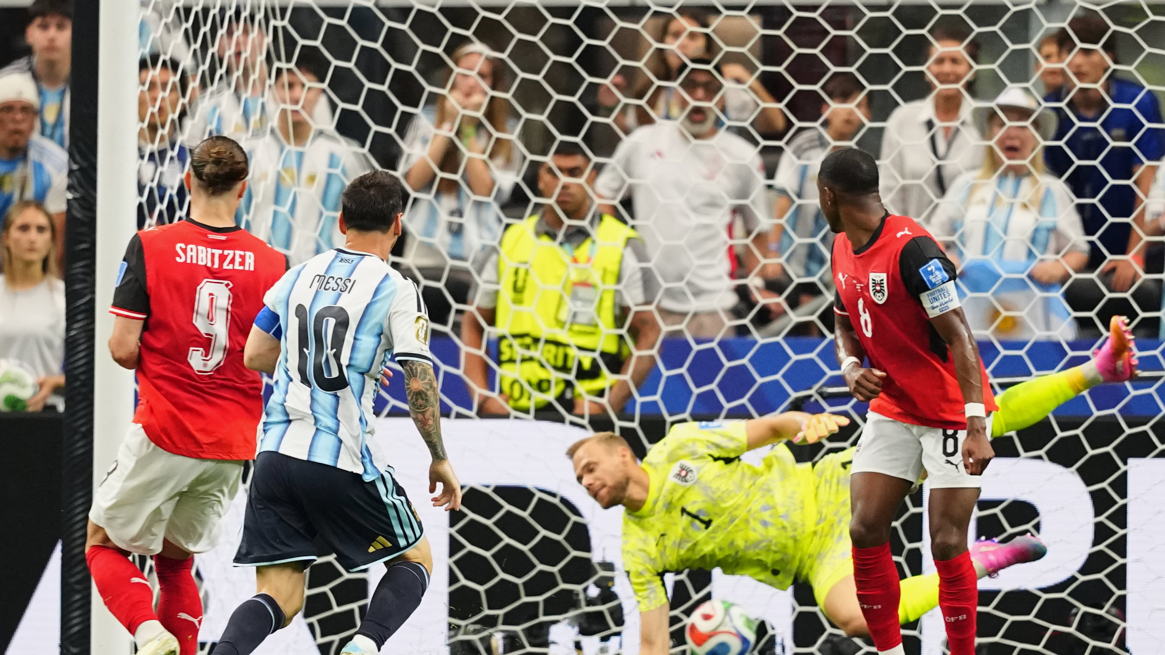 Argentina's Lionel Messi, center, scores the opening goal during the World Cup Group J soccer match between Argentina and Austria in Arlington, Texas, near Dallas, Monday, June 22, 2026. (AP Photo/Julio Cortez)