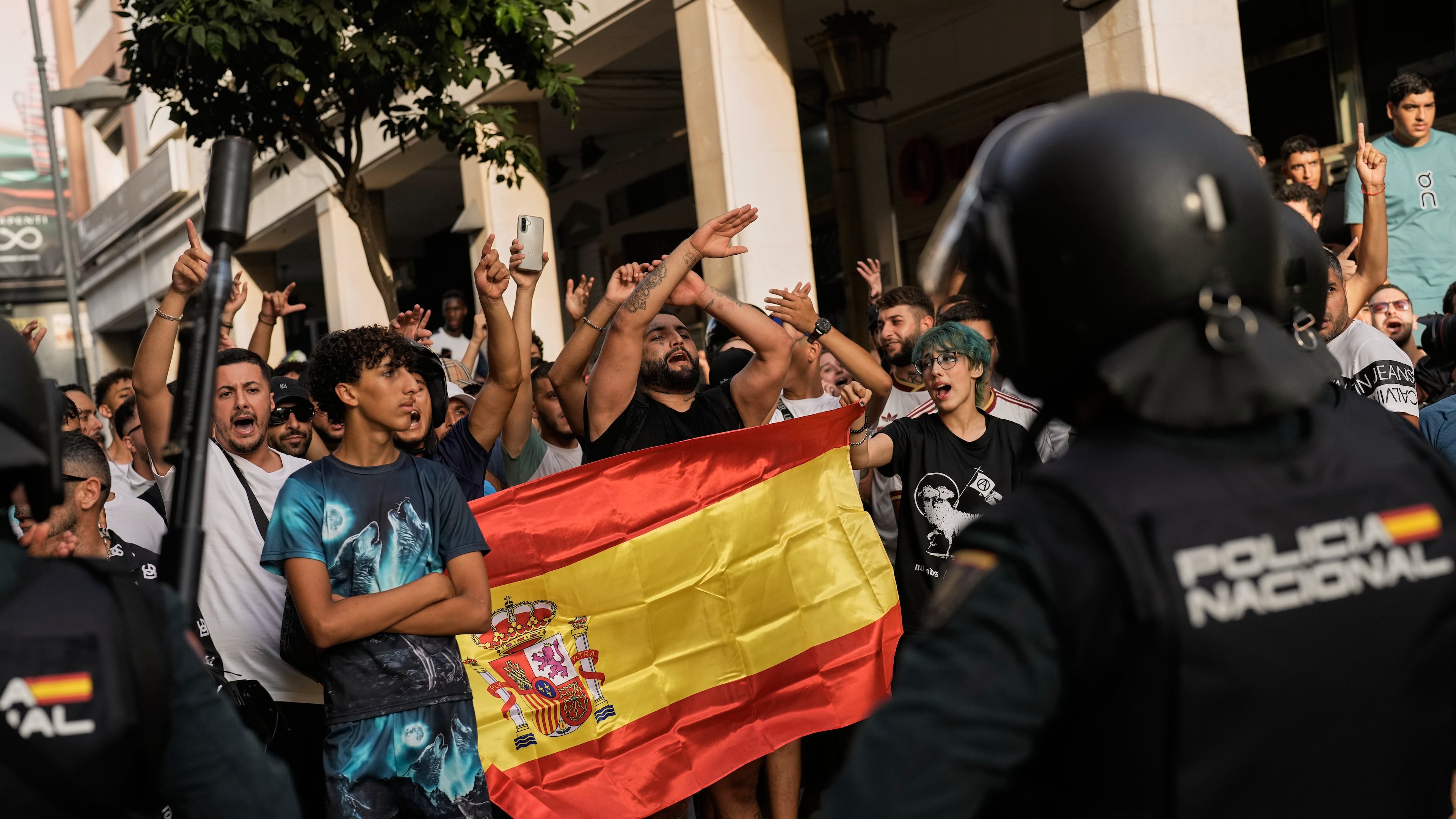 Ceuta residents demonstrate against the arrival of Spanish far-right politician Alvise Pérez in the Spanish enclave of Ceuta, Saturday, Aug. 1, 2026. (AP Photo/Bernat Armangue)