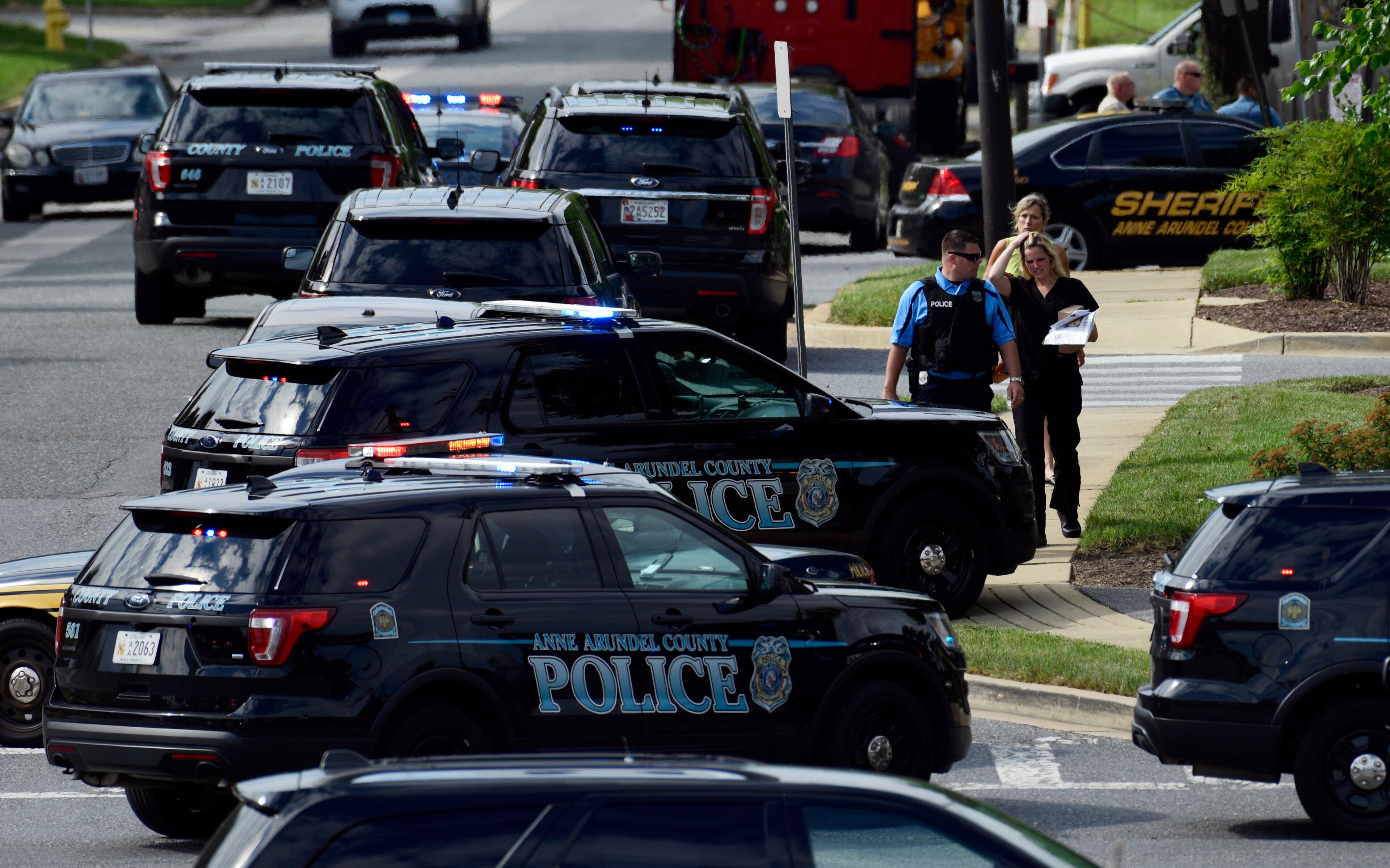Police secure the scene of a shooting at the building housing The Capital Gazette newspaper in Annapolis, Md., Thursday, June 28, 2018. (AP Photo/Susan Walsh)