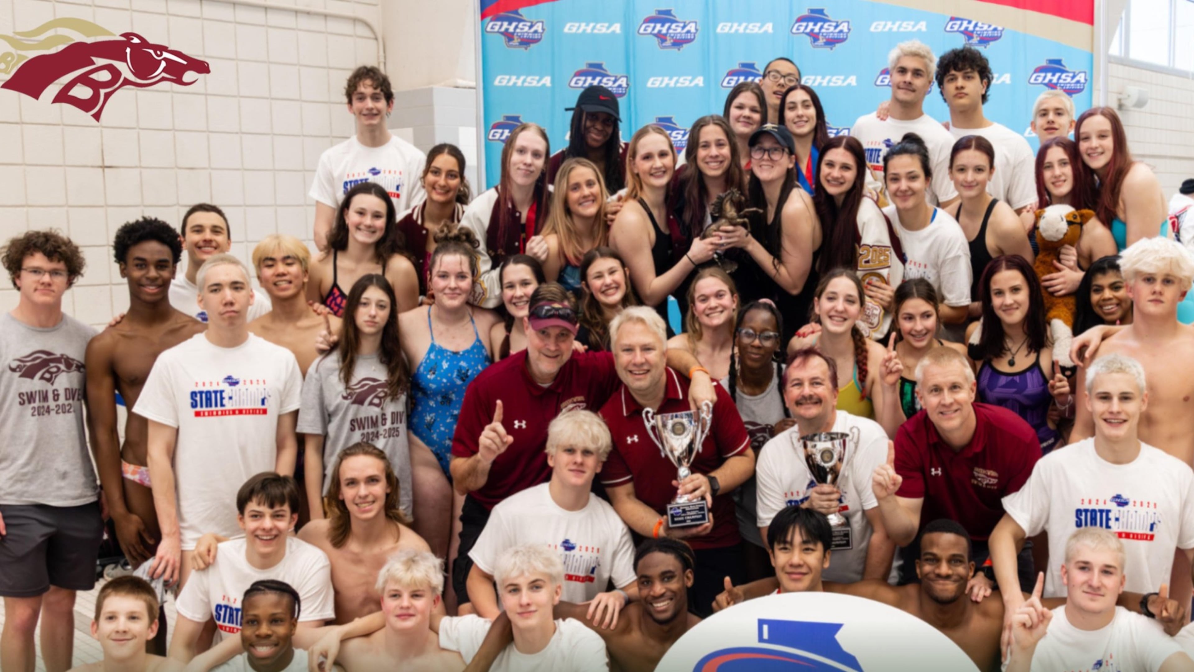 Brookwood's boys and girls teams celebrate after winning the Class 6A titles at the GHSA Swimming and Diving State Championships at Georgia Tech's McAuley Aquatic Center on Feb. 8, 2025. It was the Broncos' third sweep at the state meet in eight years. (Georgia High School Association photo)