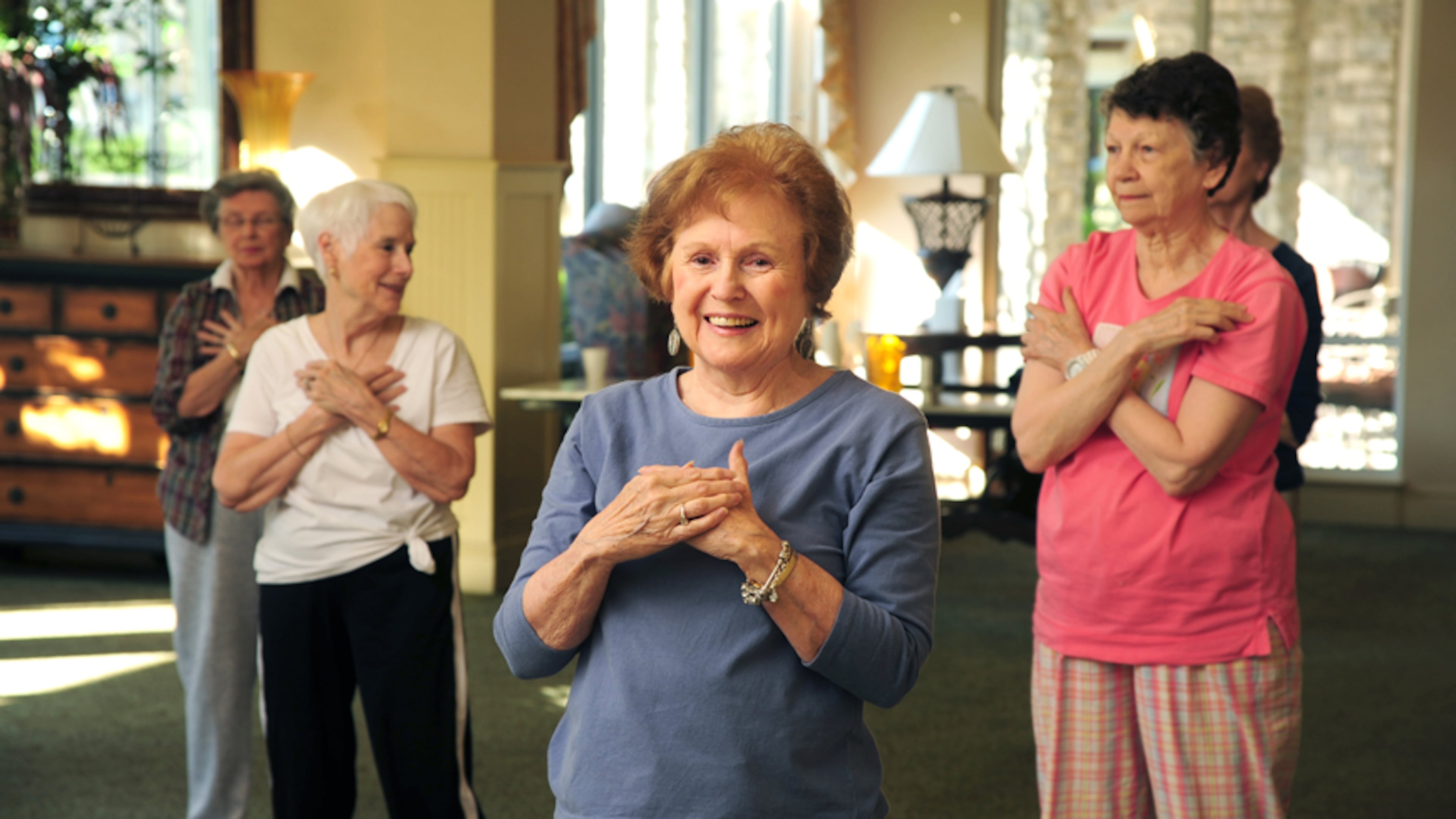 Residents at Park Springs in Stone Mountain practice Tai Chi, a graceful form of excercise which is said to help reduce stress an anxiety.