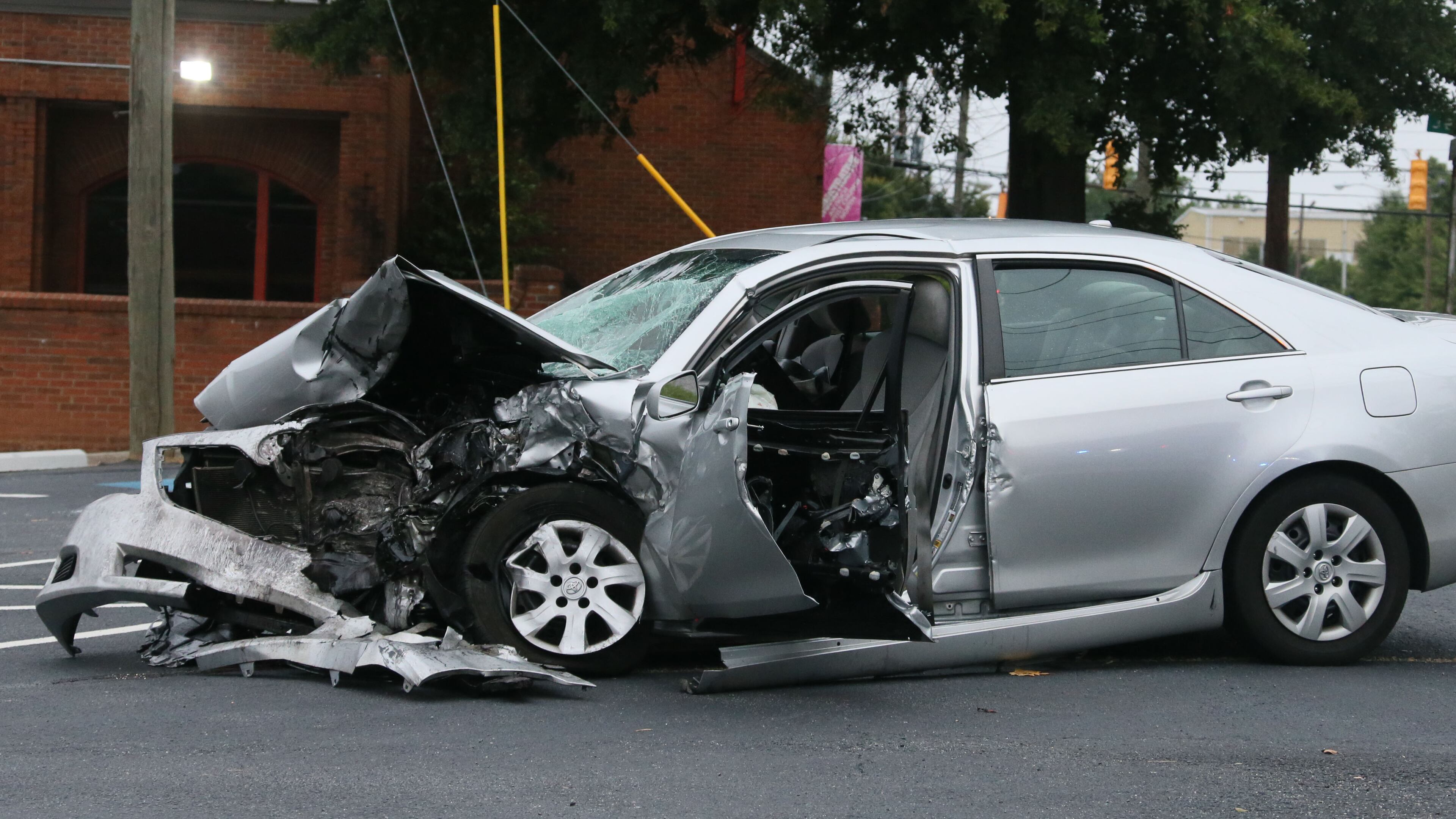 A Fulton County Jail detention officer was one of several people injured Tuesday in a predawn wreck in northwest Atlanta.