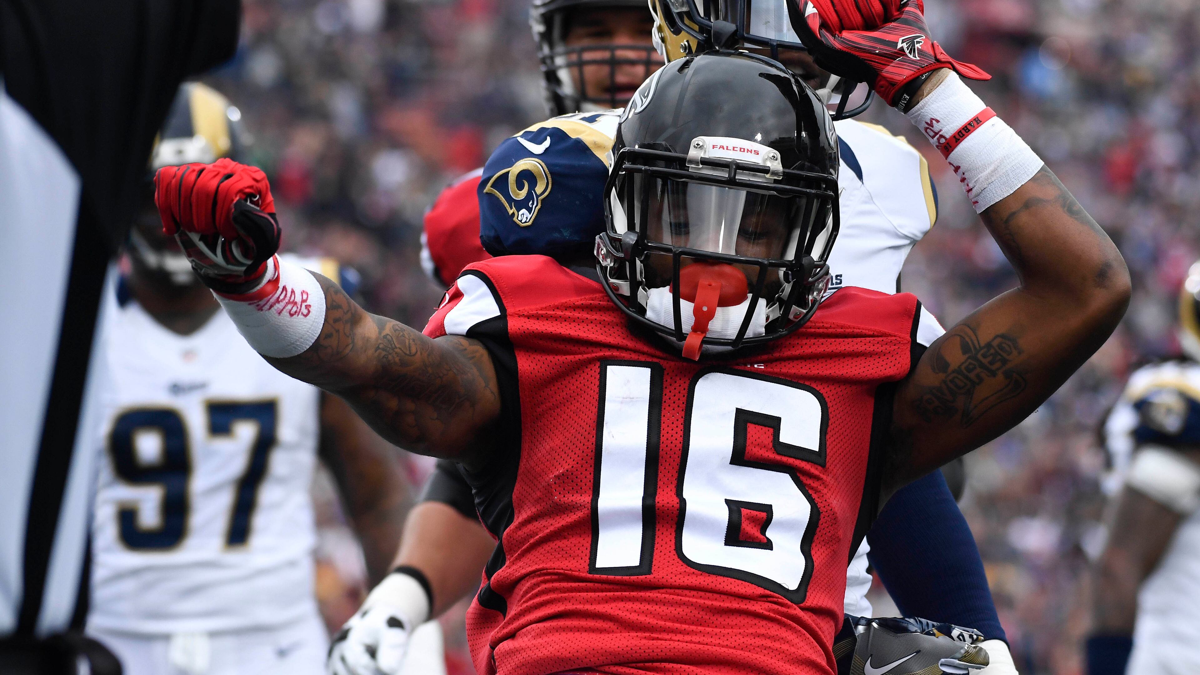 Falcons wide receiver Justin Hardy celebrates after his touchdown 10 seconds into the game after the Los Angeles Rams fumbled the opening kickoff Sunday at the L.A. Coliseum. The Falcons jumped out to a 21-0 lead in the first half. (AP photo)
