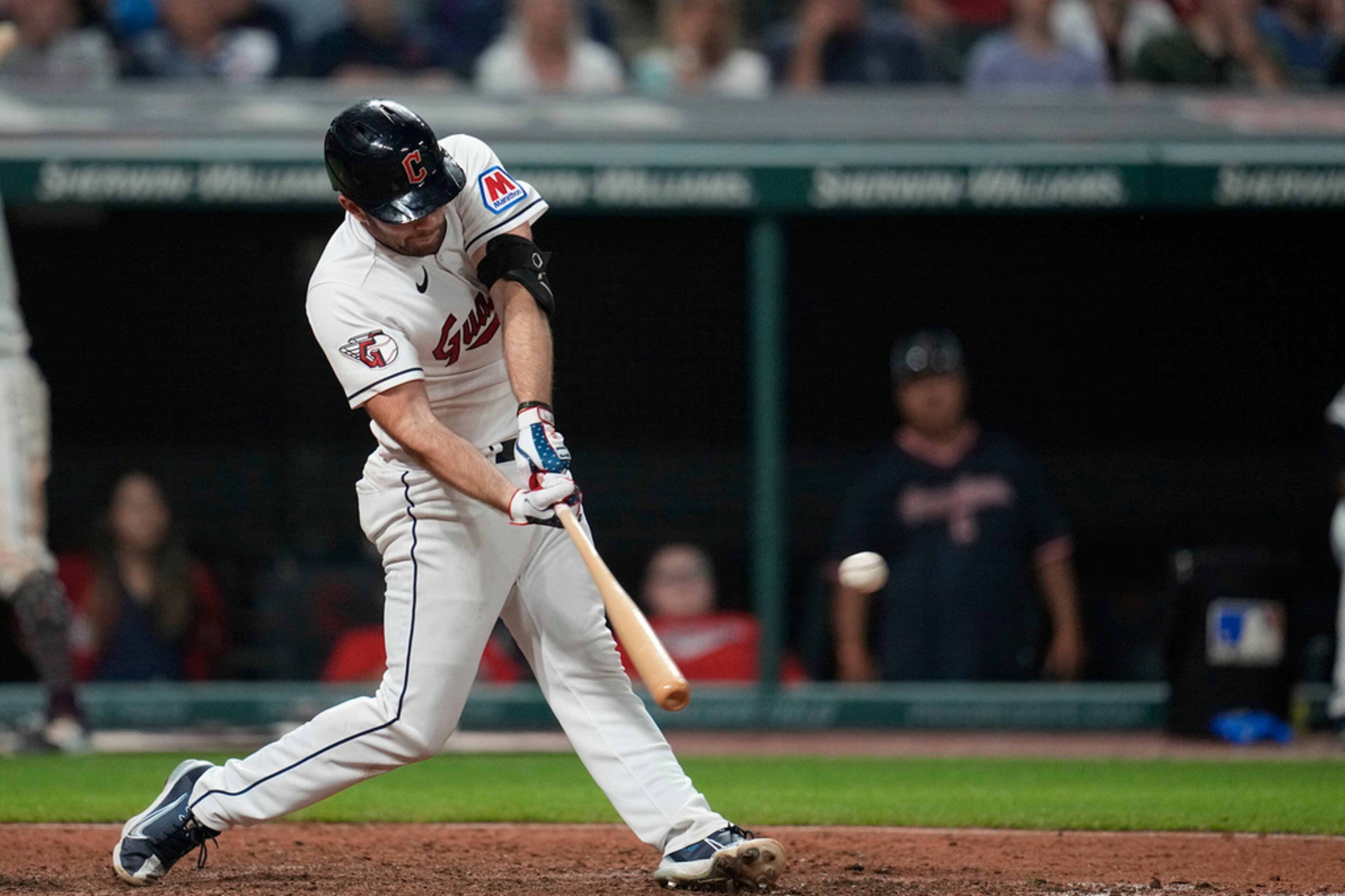 Cleveland Guardians' David Fry hits a game-winning single in the tenth inning of a baseball game against the Atlanta Braves, Tuesday, July 4, 2023, in Cleveland. (AP Photo/Sue Ogrocki)