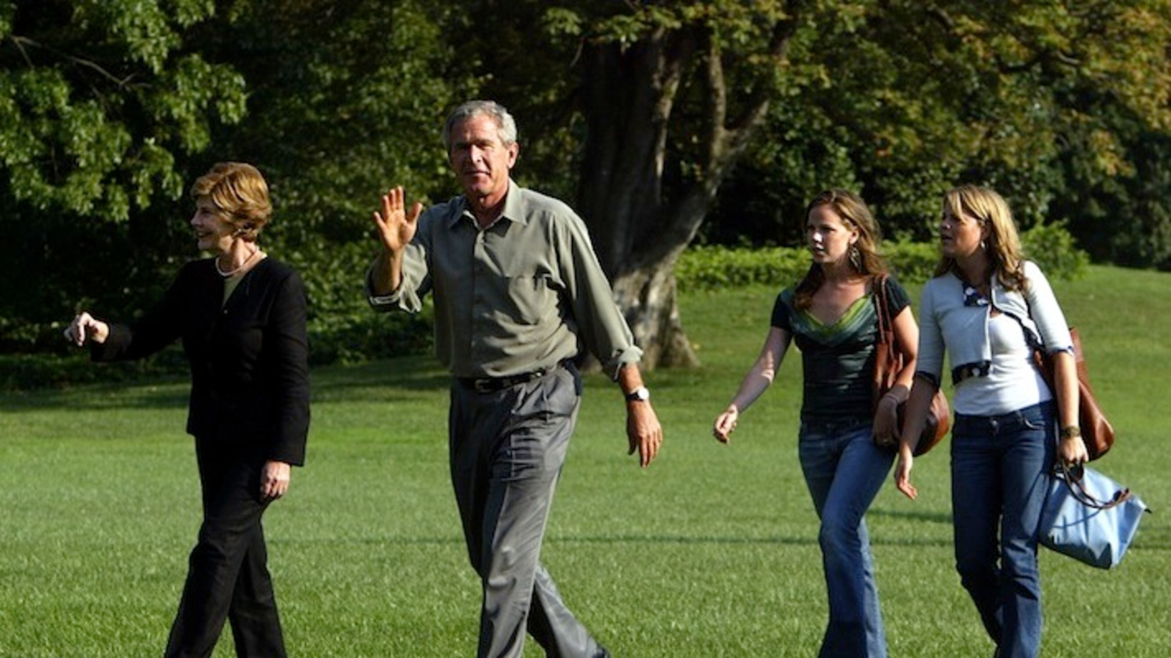 President and first lady Laura Bush with their twin daughters Jenna, right, and Barbara Bush, second right, return to the White House from a day trip in Ohio and Pennsylvania, Saturday, Sep. 4, 2004, in Washington. (AP Photo/Manuel Balce Ceneta)