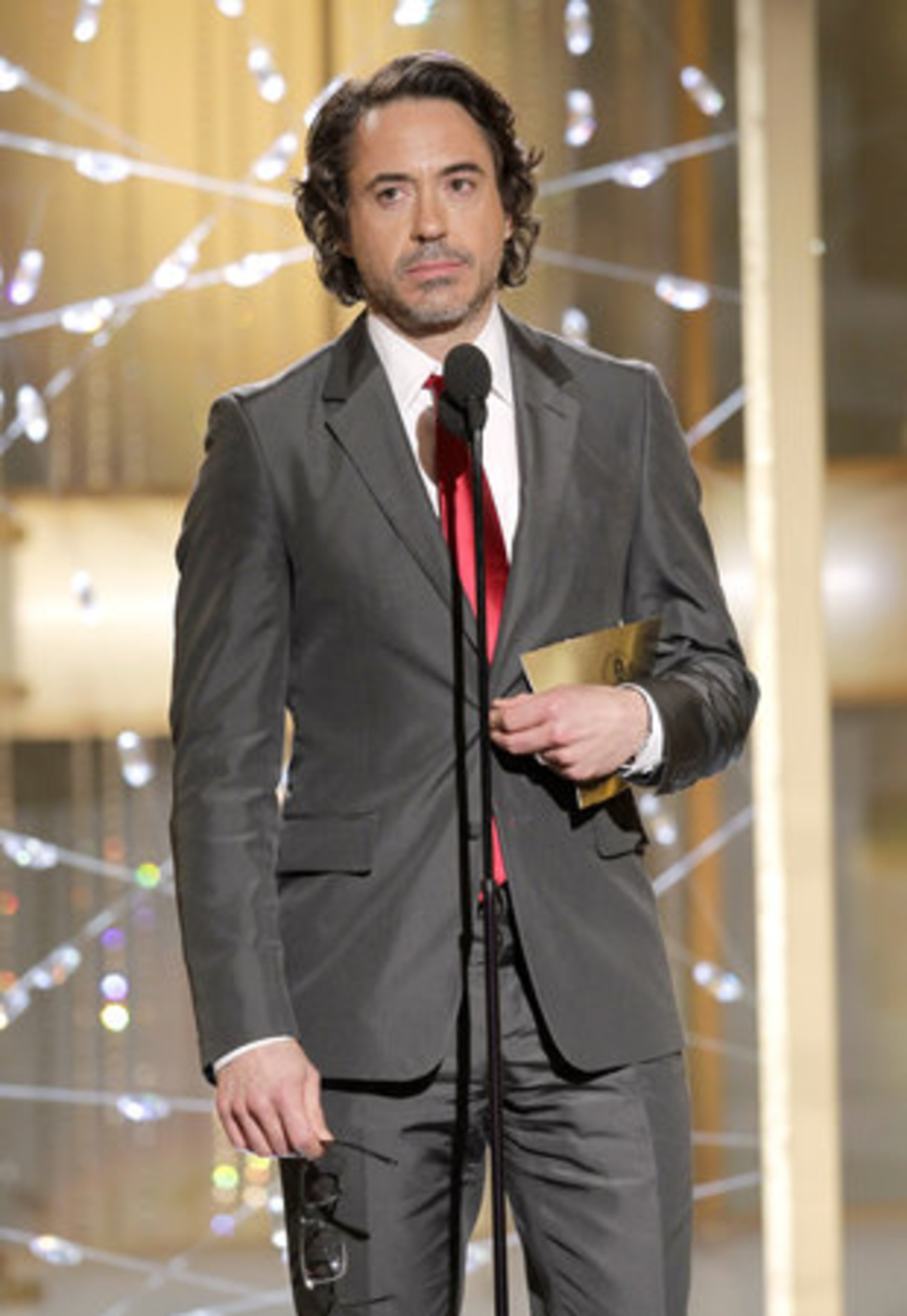 In this publicity image released by NBC, presenter Robert Downey Jr. is shown during the Golden Globe Awards, Sunday, Jan. 16, 2011 in Beverly Hills, Calif.