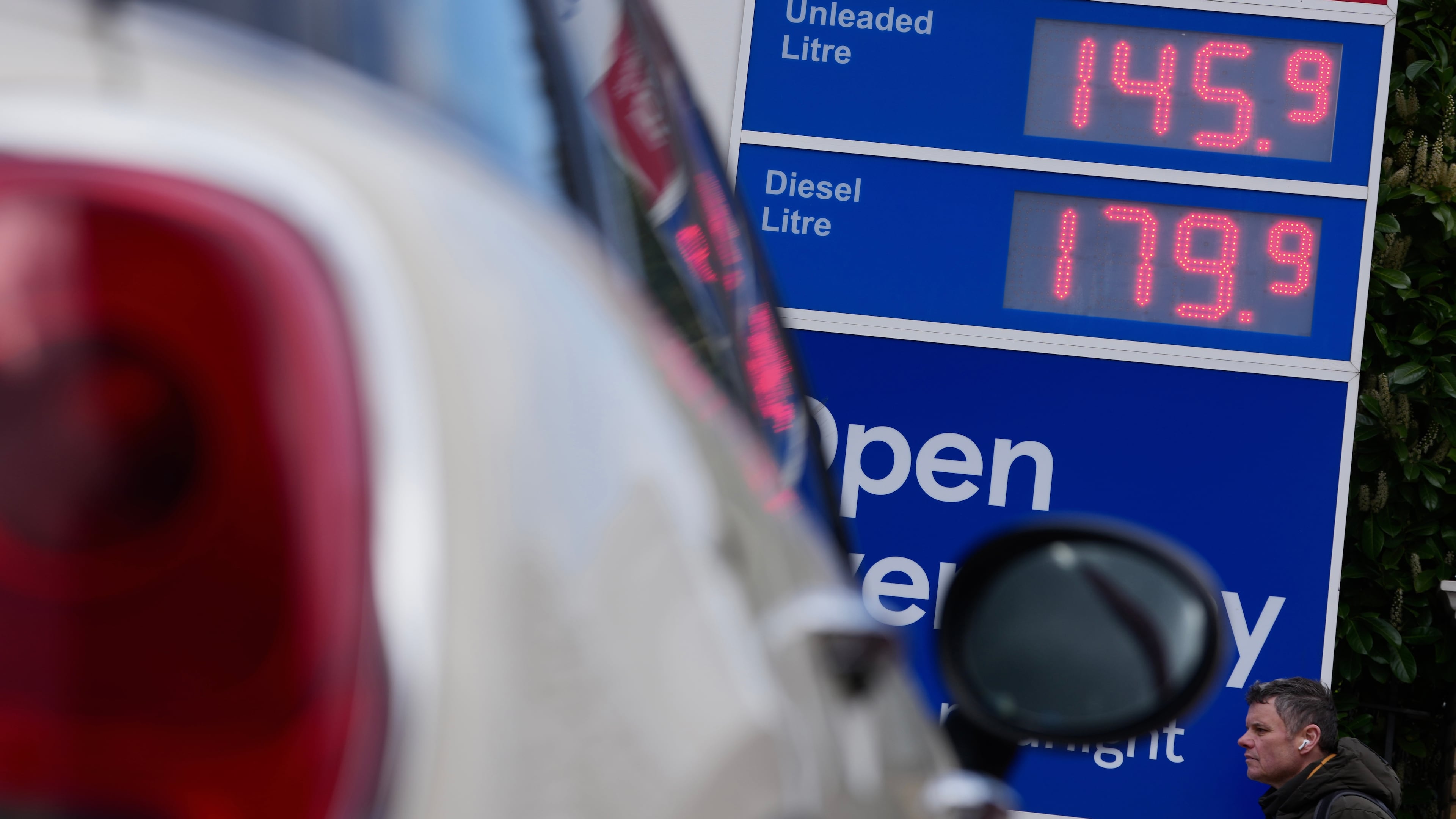 FILE - Prices are shown on a board at a gas station in London, England, Monday, March 30, 2026. (AP Photo/Kin Cheung, File)