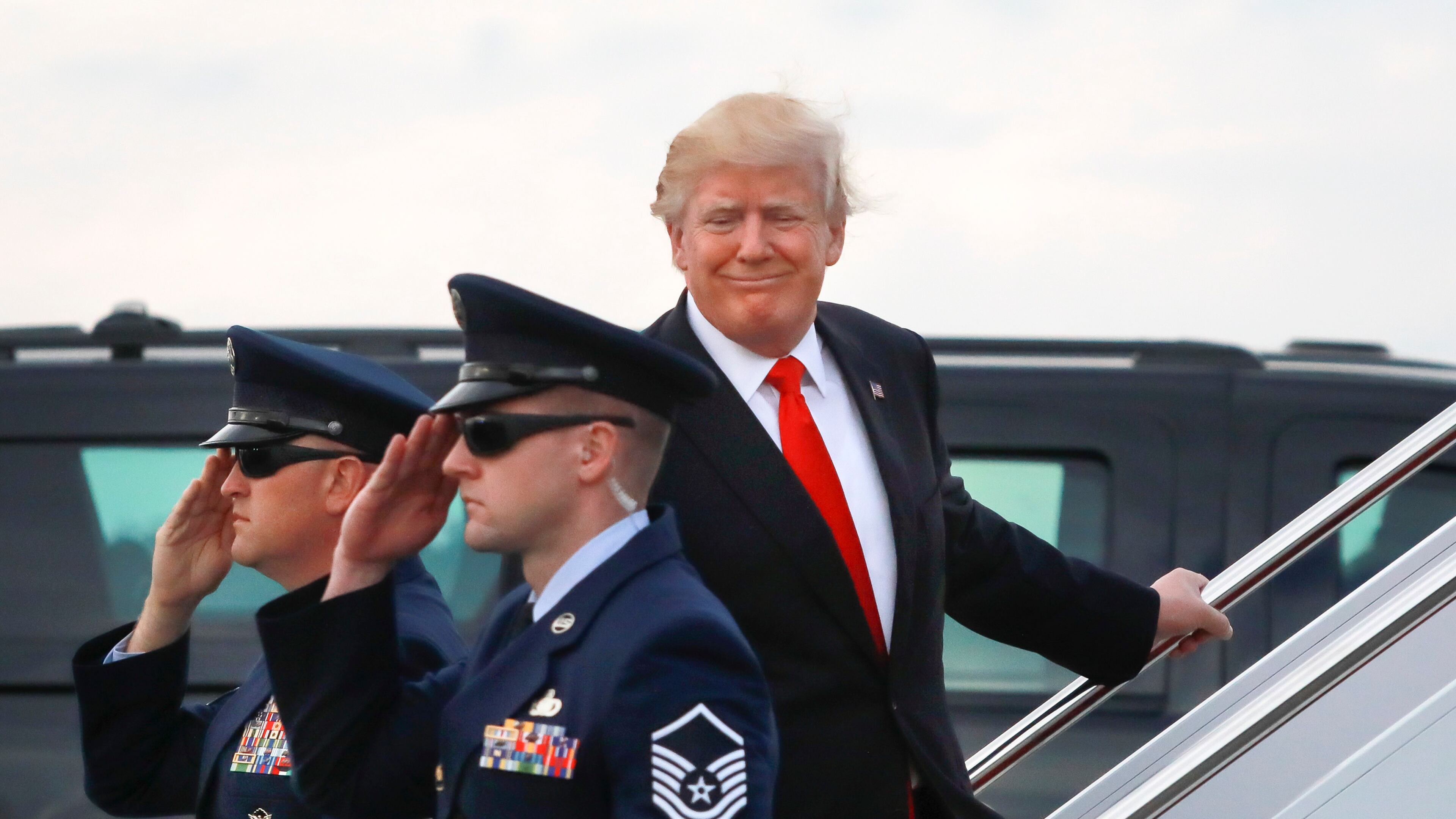 President Donald Trump boards Air Force One at Palm Beach International Airport in West Palm Beach Monday, January 1, 2018. (Bruce R. Bennett / The Palm Beach Post)