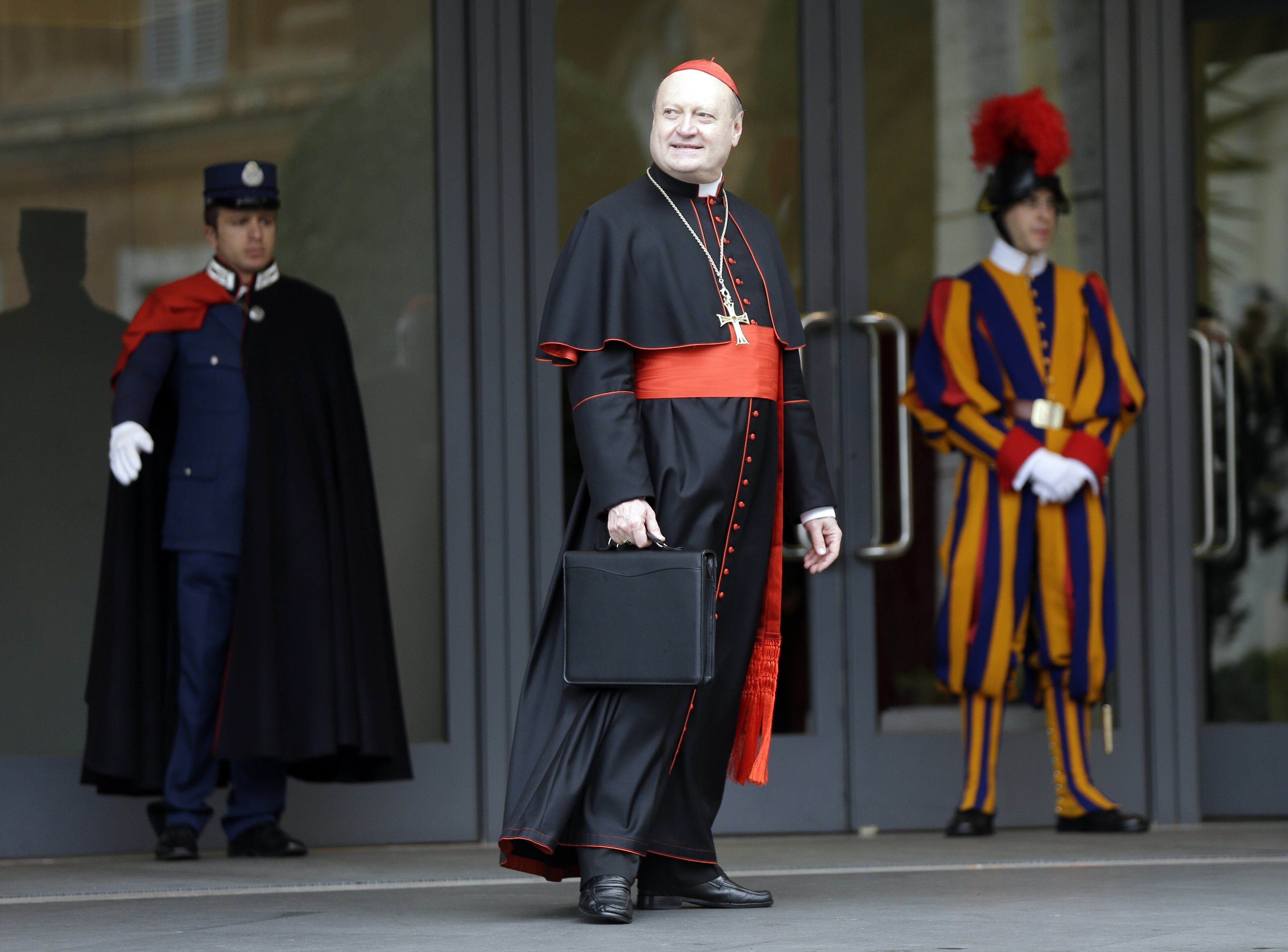 Cardinal Gianfranco Ravasi arrives for an afternoon meeting, at the Vatican, Friday, March 8, 2013. The Vatican says the conclave to elect a new pope will likely start in the first few days of next week. The Rev. Federico Lombardi told reporters that cardinals will vote Friday afternoon on the start date of the conclave but said it was "likely" they would choose Monday, Tuesday or Wednesday. The cardinals have been attending pre-conclave meetings to discuss the problems of the church and decide who among them is best suited to fix them as pope. (AP Photo/Alessandra Tarantino)