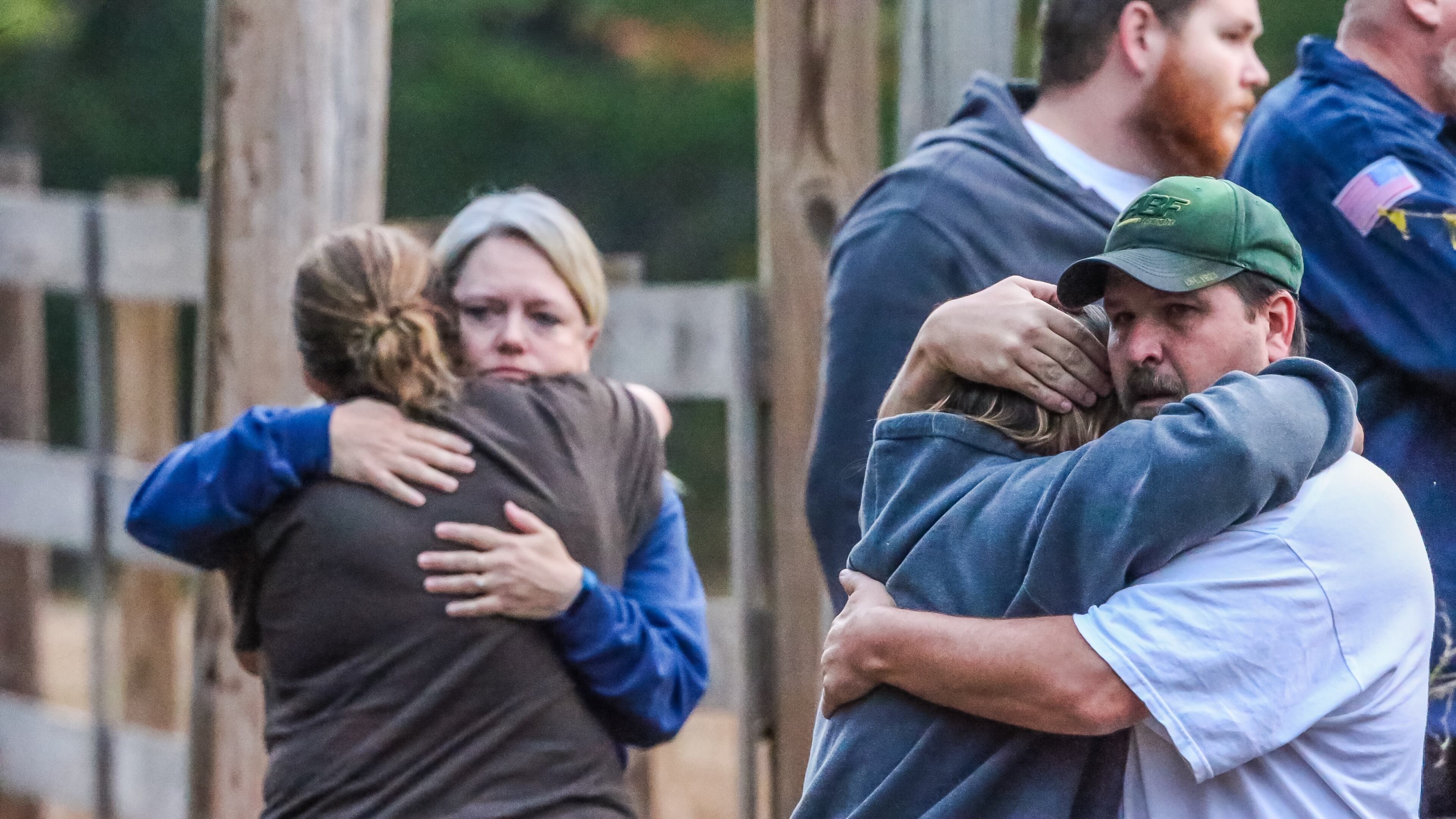 Distraught family members arrived on the scene of a quadruple shooting Thursday in McDonough. JOHN SPINK / JSPINK@AJC.COM