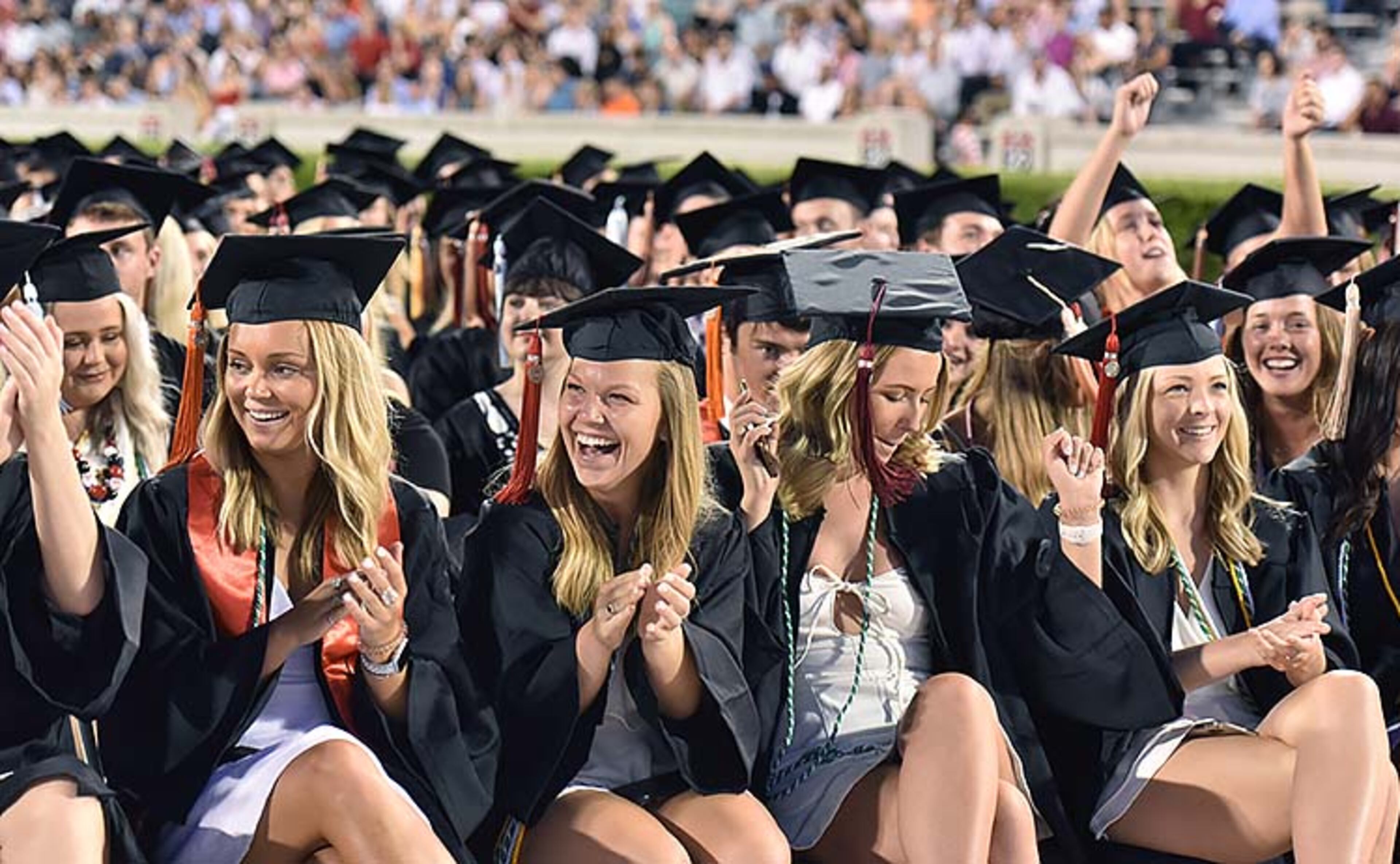 May 10, 2019 Athens - Students react before they move their tassels during UGA's 2019 spring undergraduate commencement ceremony at Sanford Stadium in Athens on Friday, May 10, 2019. HYOSUB SHIN / HSHIN@AJC.COM