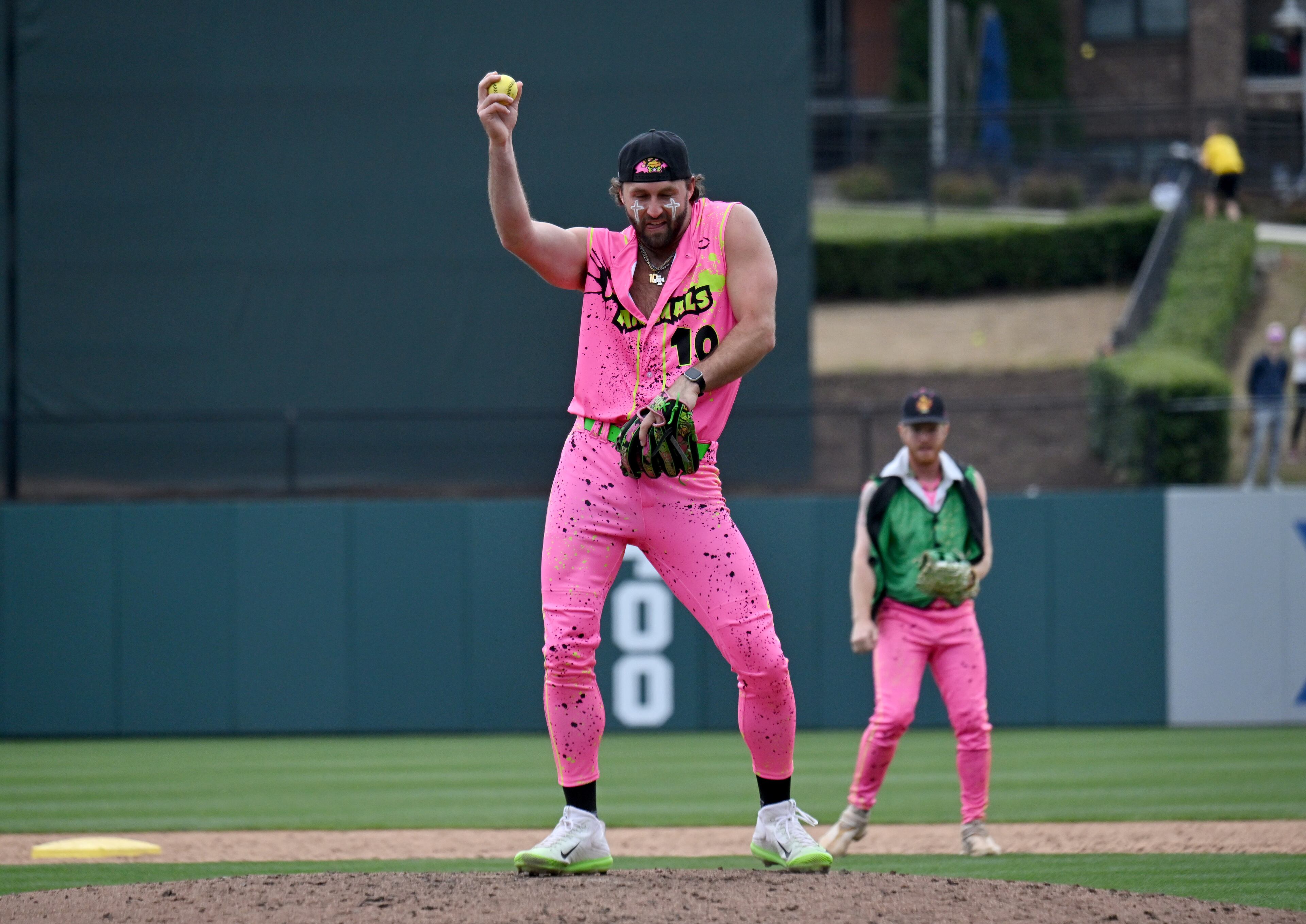 Party Animals' Bret Helton dances before throwing a pitch. (Hyosub Shin / Hyosub.Shin@ajc.com)