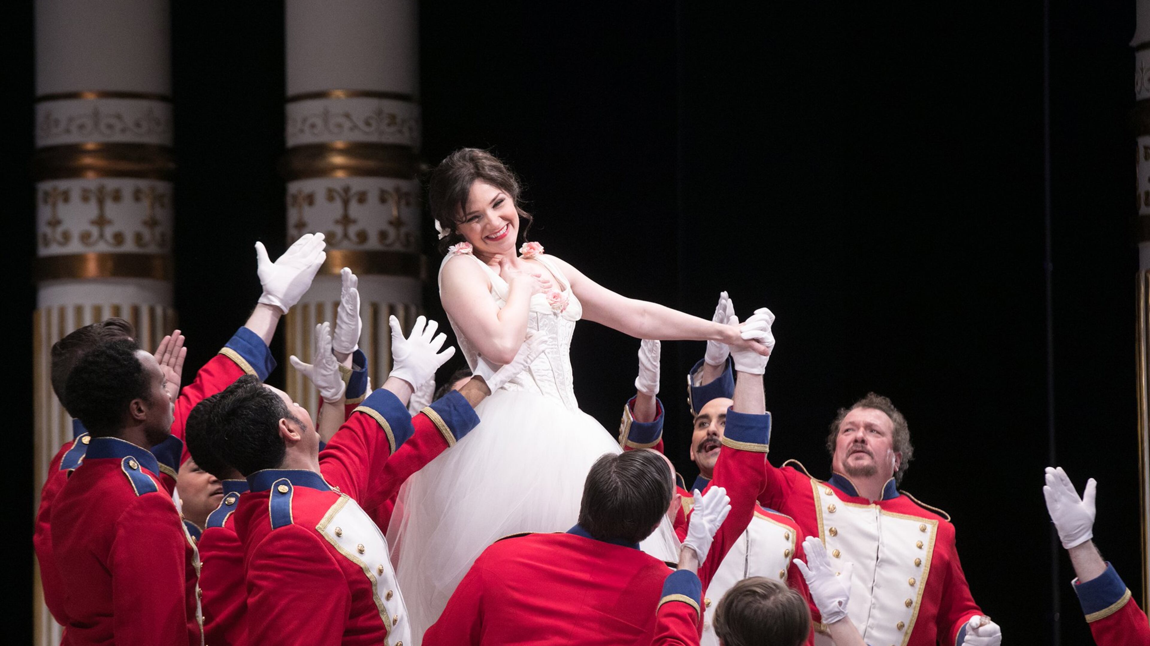 Andriana Chuchman performs with members of the Atlanta Opera chorus in “The Daughter of the Regiment.” CONTRIBUTED BY JEFF ROFFMAN
