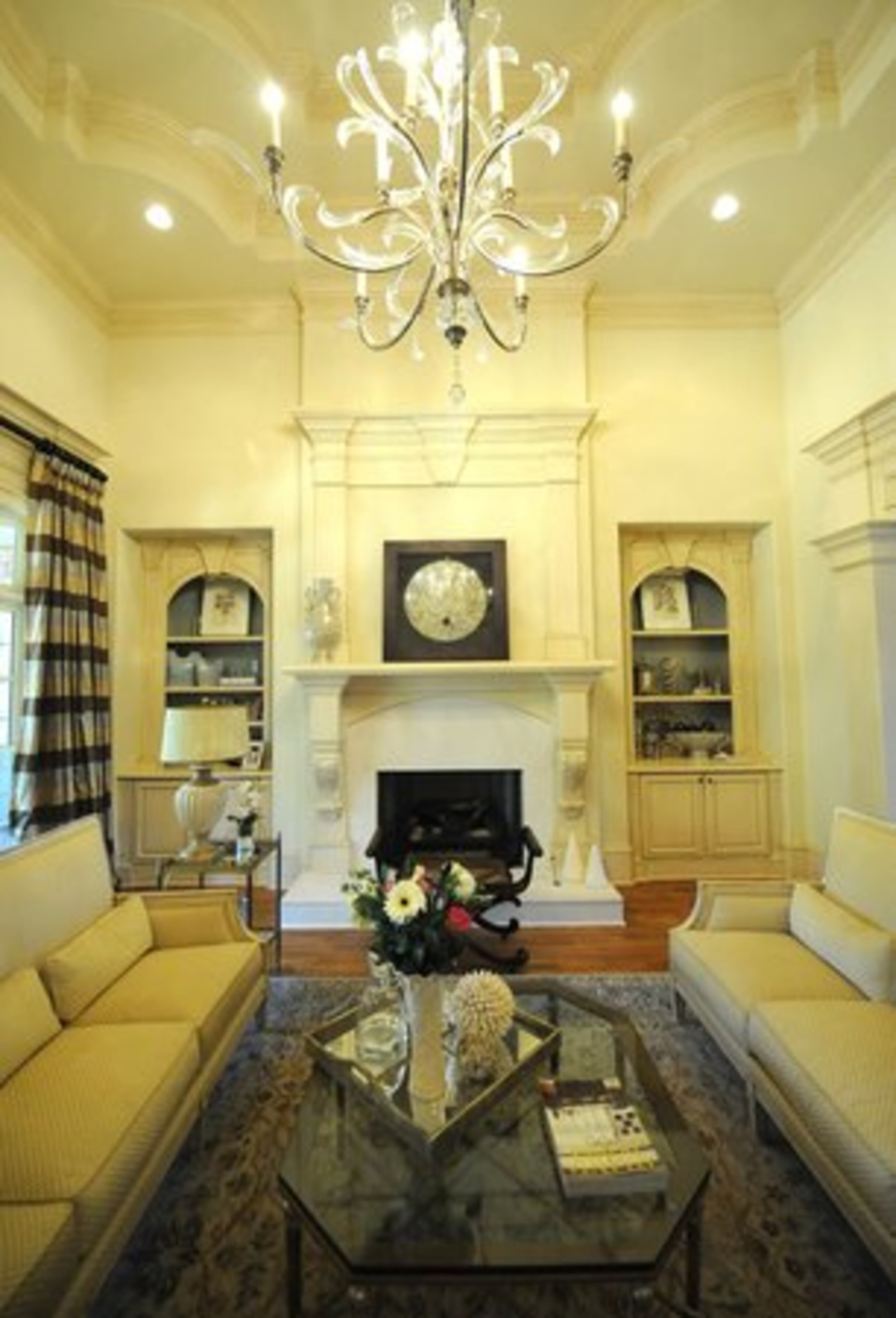 The great room is one of Vicky's favorites. She says it showcases the more modern style she likes. The crystal chandelier has a transitional flavor, says Cynthia Davis of CCD Interiors in Roswell, the Slocums' designer.