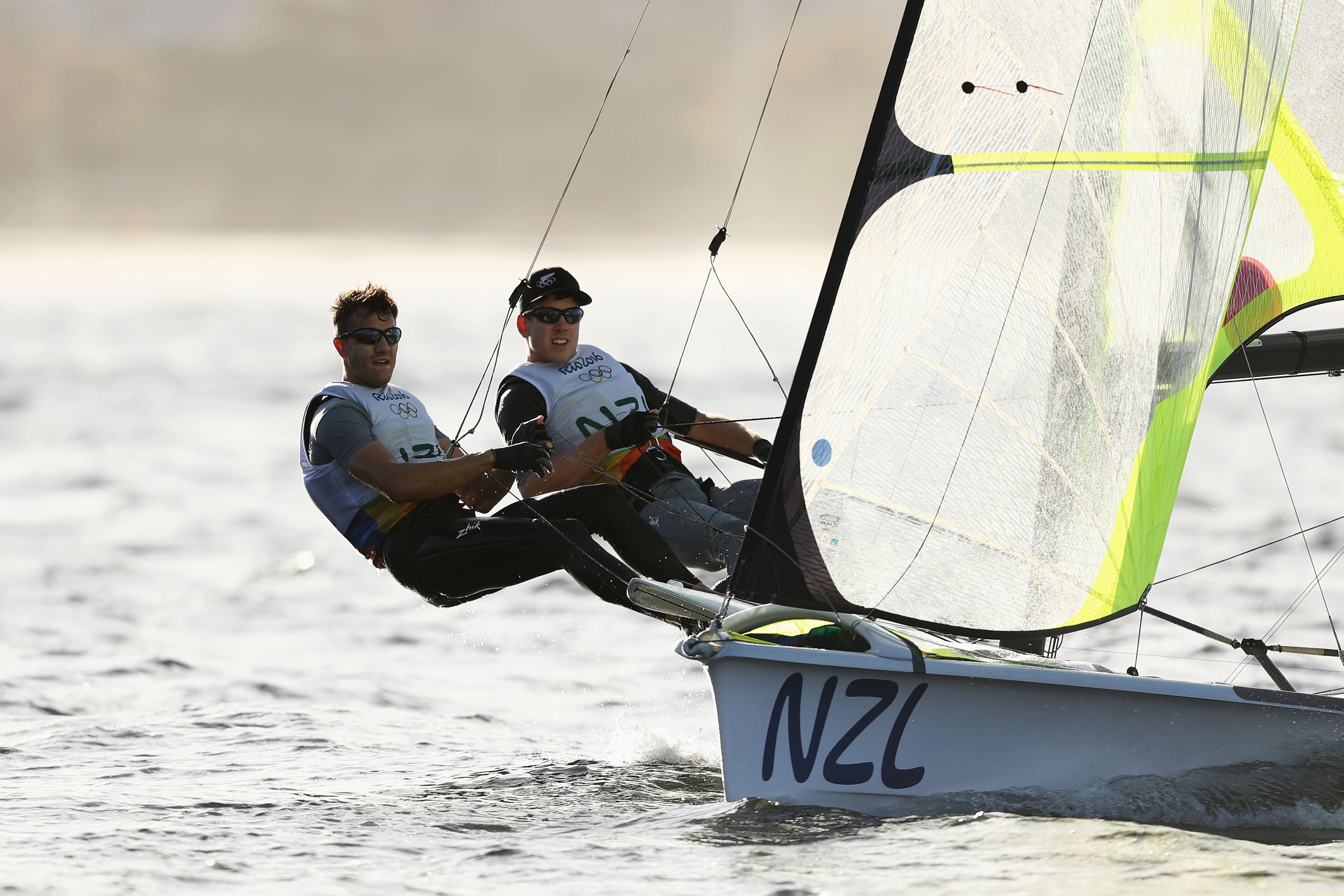 RIO DE JANEIRO, BRAZIL - AUGUST 12: Peter Burling of New Zealand and Blair Tuke of New Zealand compete in the Men's 49er FX class on Day 7 of the Rio 2016 Olympic Games at Marina da Gloria on August 12, 2016 in Rio de Janeiro, Brazil. (Photo by Paul Gilham/Getty Images)