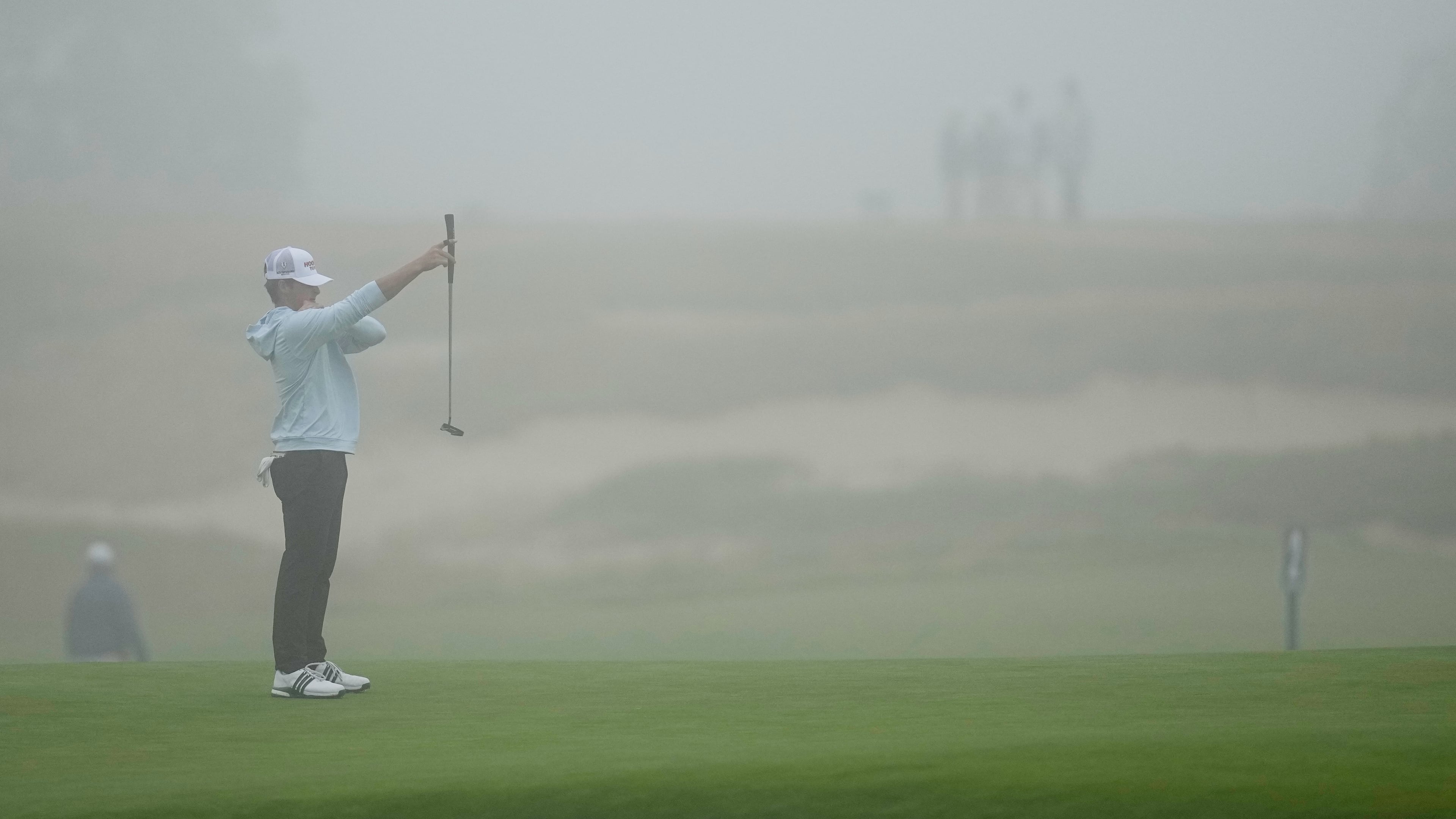 Chase Kyes lines up a putt on the first hole during the first round of the U.S. Open golf tournament at Shinnecock Hills Golf Club in Southampton, N.Y., Thursday, June 18, 2026.(AP Photo/David J. Phillip)