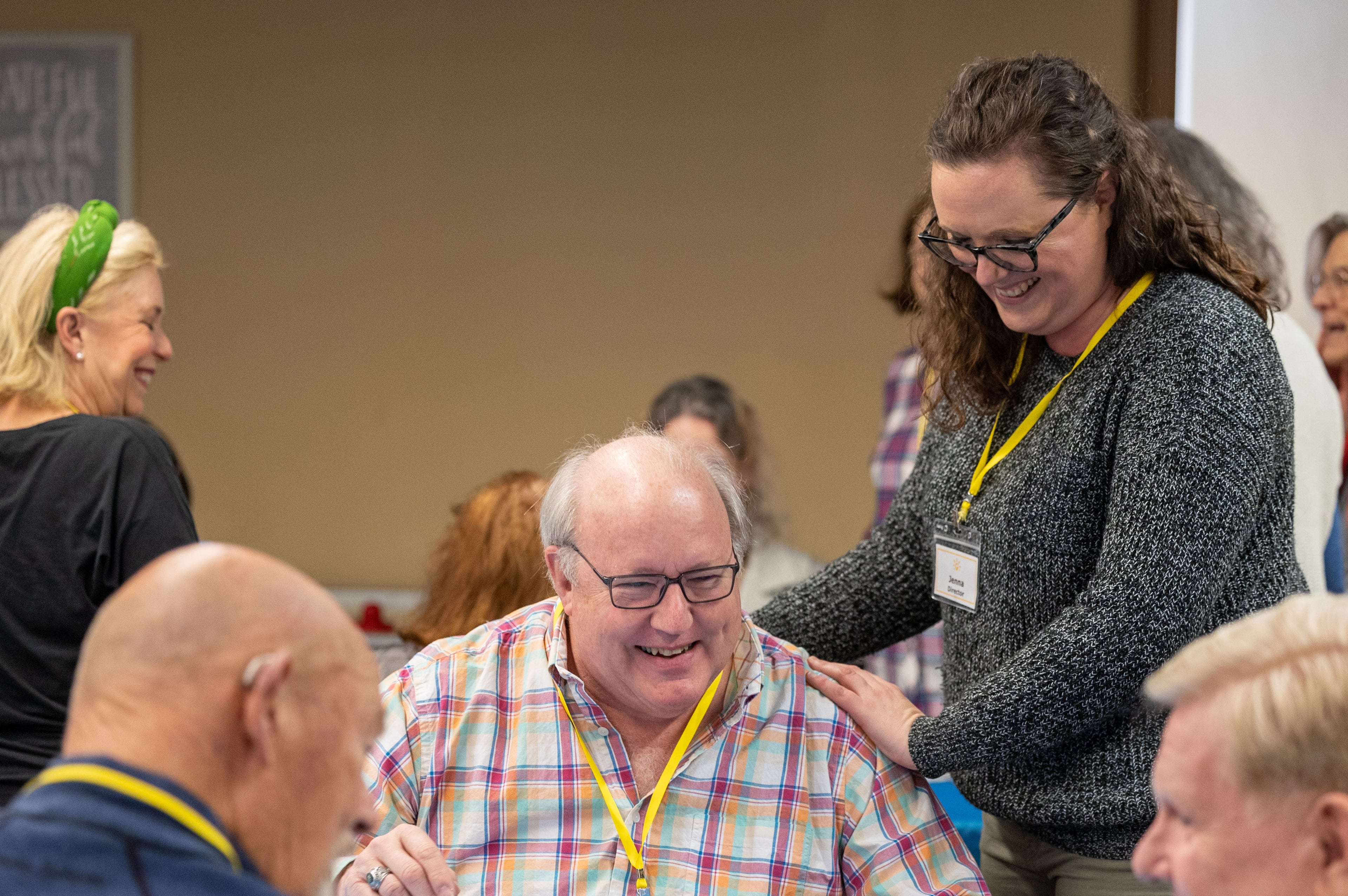 Member Doug Jones (who agreed to be photographed) jokes with Executive Director Jenna Smith while working on an art project during a Respite Care Atlanta meeting at Second-Ponce de Leon Baptist Church in Atlanta in 2022. (Phil Skinner for the AJC)