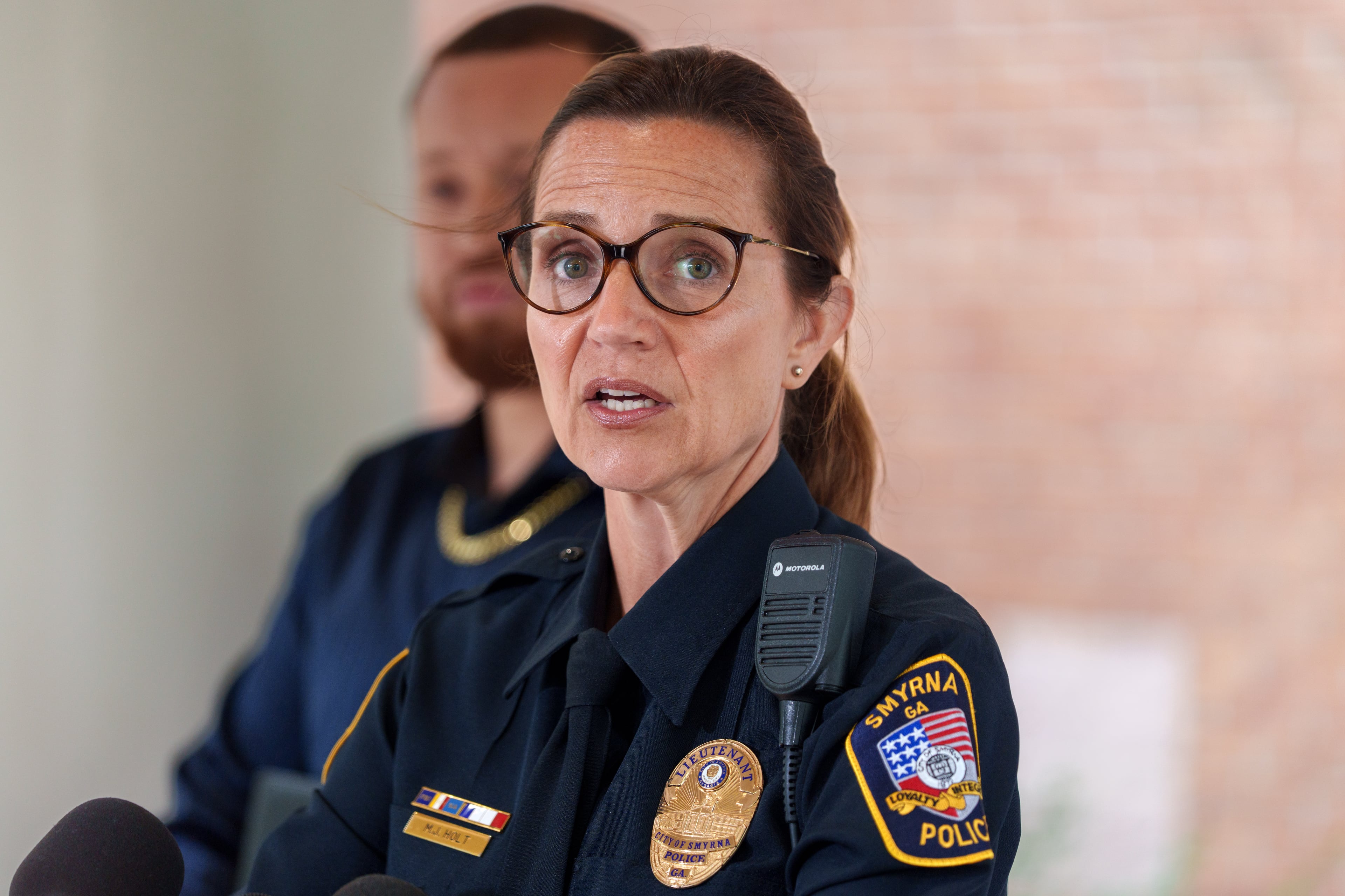 Smyrna police spokesperson Lt. Meredith Holt speaks during a news conference on Friday, Sept. 25, 2026, after a woman’s dismembered body was found at Park Valley Apartments. (Ben Hendren for the AJC)