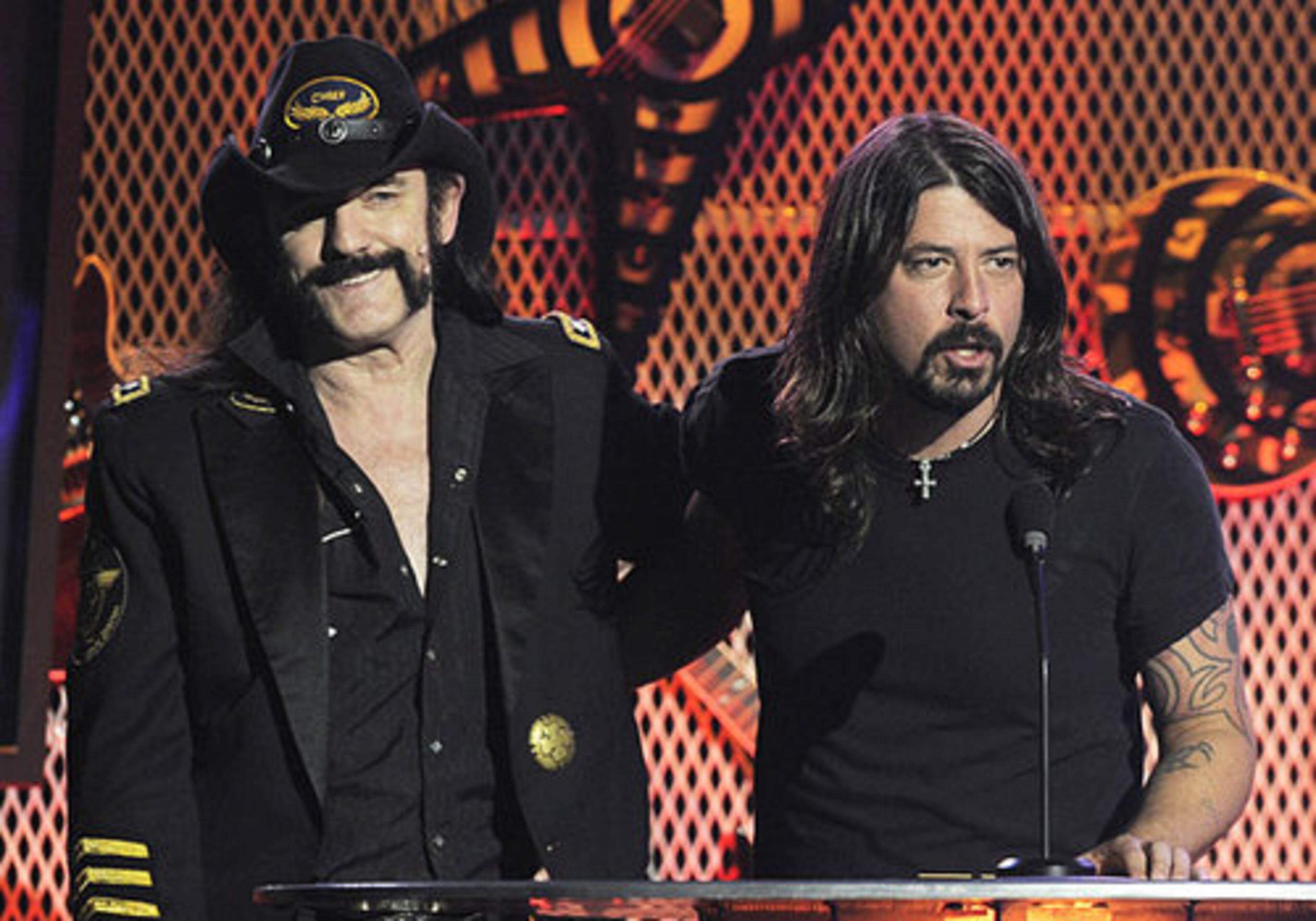 Motorhead singer Lemmy Kilmister, left, is presented with the Splatterhouse Lifetime Achievement Award by Dave Grohl.