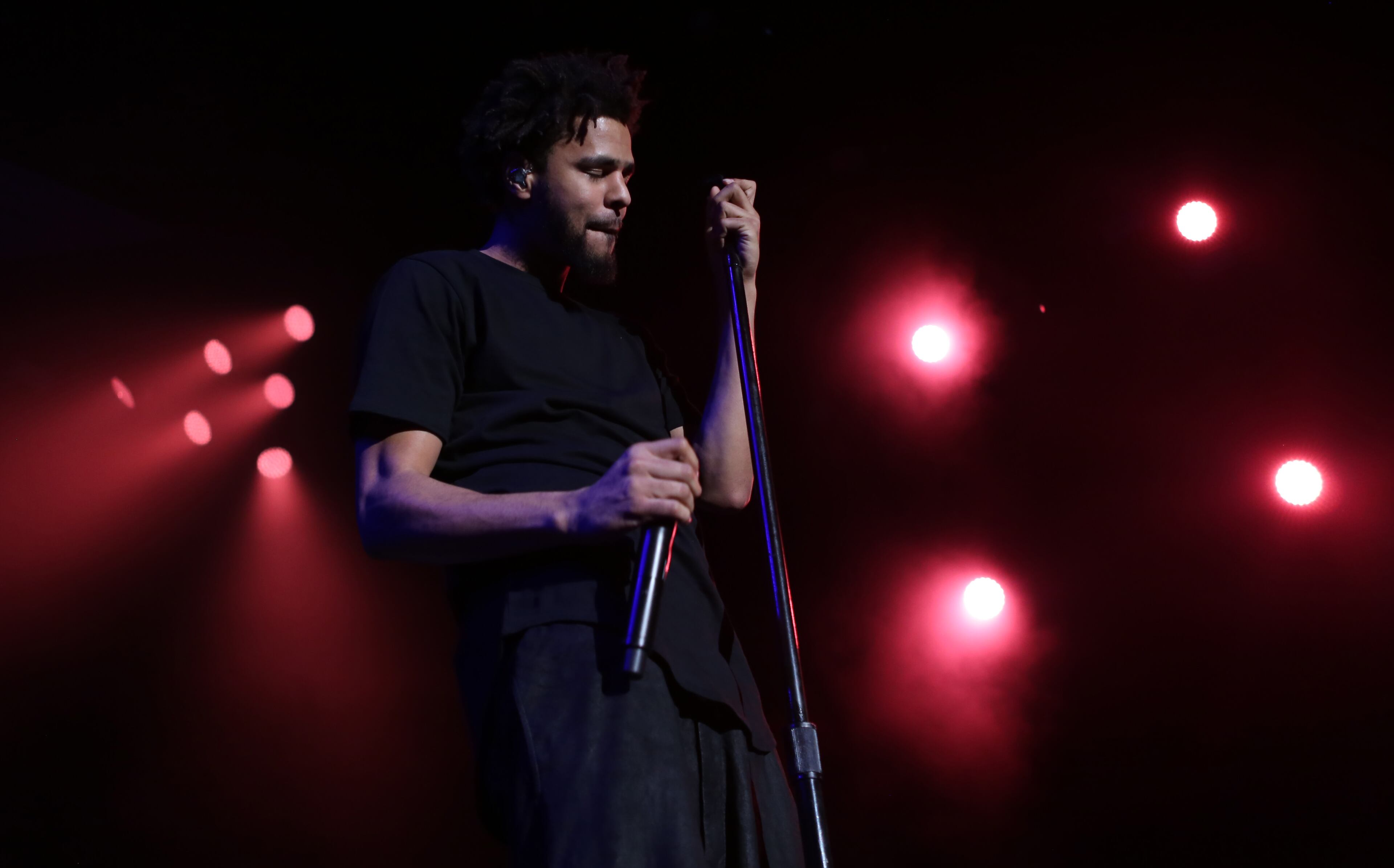 ATLANTA - J. Cole brings his "Forest Hills Drive Tour", in support of his third studio album, "2014 Forest Hills Drive" to Aaron's Amphitheatre at Lakewood on Saturday, Aug. 15, 2015 in Atlanta. He performed the new album in it's entirety while running a narrative on the background on the making of each song. Forest Hill Drive is the street he grew up on in his hometown in Fayetteville, NC. (Akili-Casundria Ramsess/Special to the AJC)