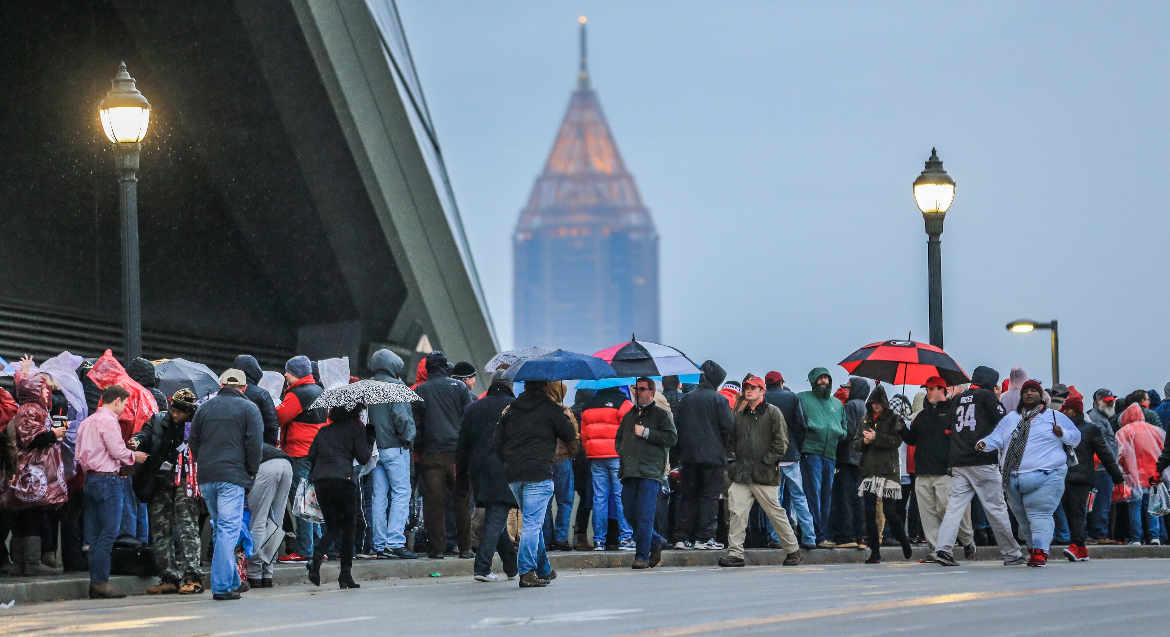 January 8, 2018 Atlanta: in downtown Atlanta on Monday, Jan. 8, 2018. The Alabama Crimson Tide were 3.5-point favorites going into Monday nights College Football Playoff Championship against the Georgia Bulldogs at Atlantas Mercedes-Benz Stadium. Gov. Nathan Deal ordered non-essential state offices from Columbus to Augusta and northward to close Monday, and city of Atlanta officials announced a similar order for local offices. Officials began announcing closures to ease traffic burdens early, in large part because of the game. The 8pm kick off for the championship, will see US President Donald Trump in attendance. Kendrick Lamar was scheduled to perform a free halftime concert at Centennial Olympic Park. JOHN SPINK/JSPINK@AJC.COM