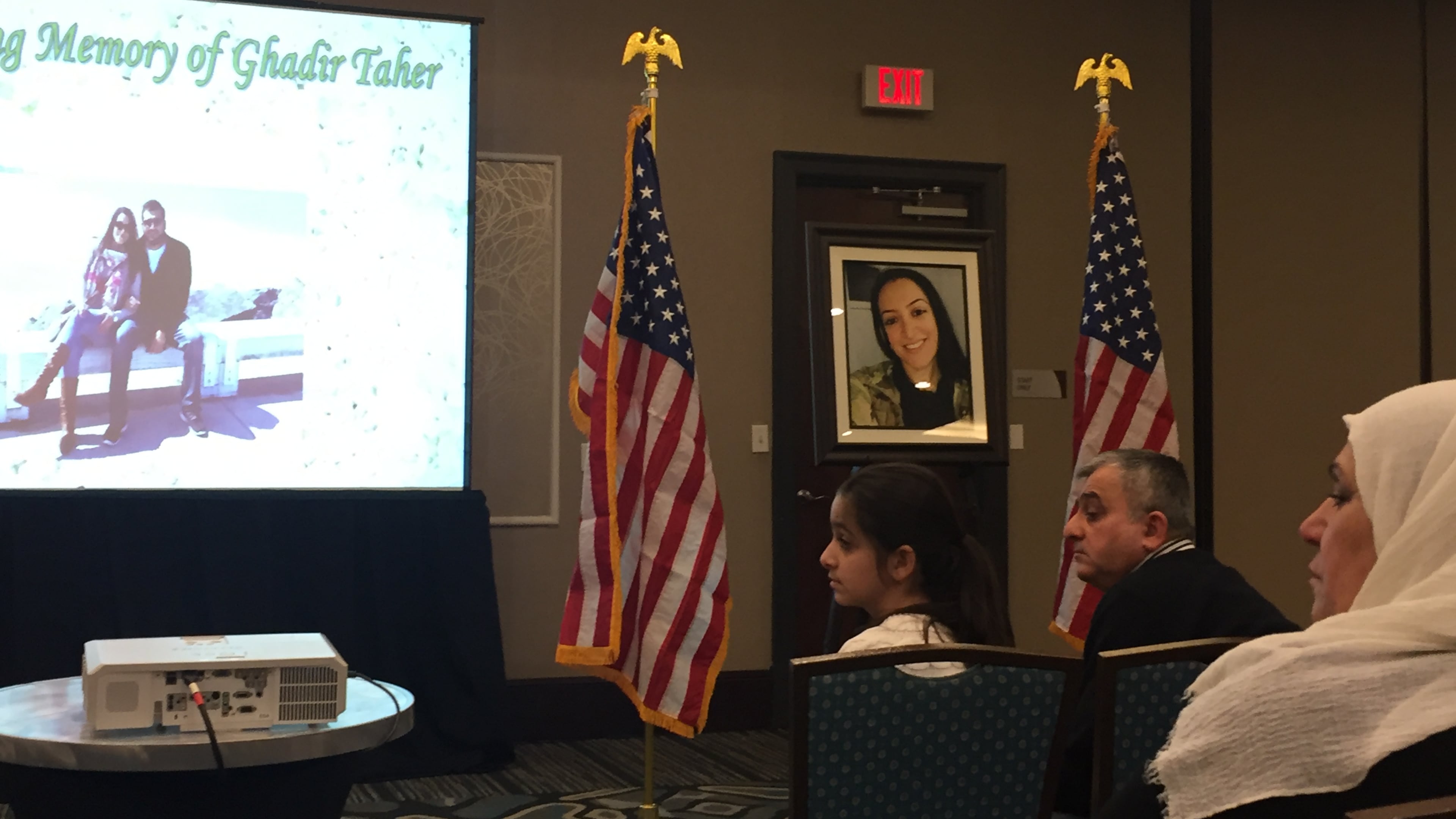 Family and friends listen to speakers at the memorial Saturday for Ghadir Taher, a Syrian-American translator for a U.S. military contractor. The 27-year-old died in Syria in a bombing this month. (Photo: Ariel Hart / ahart@ajc.com)