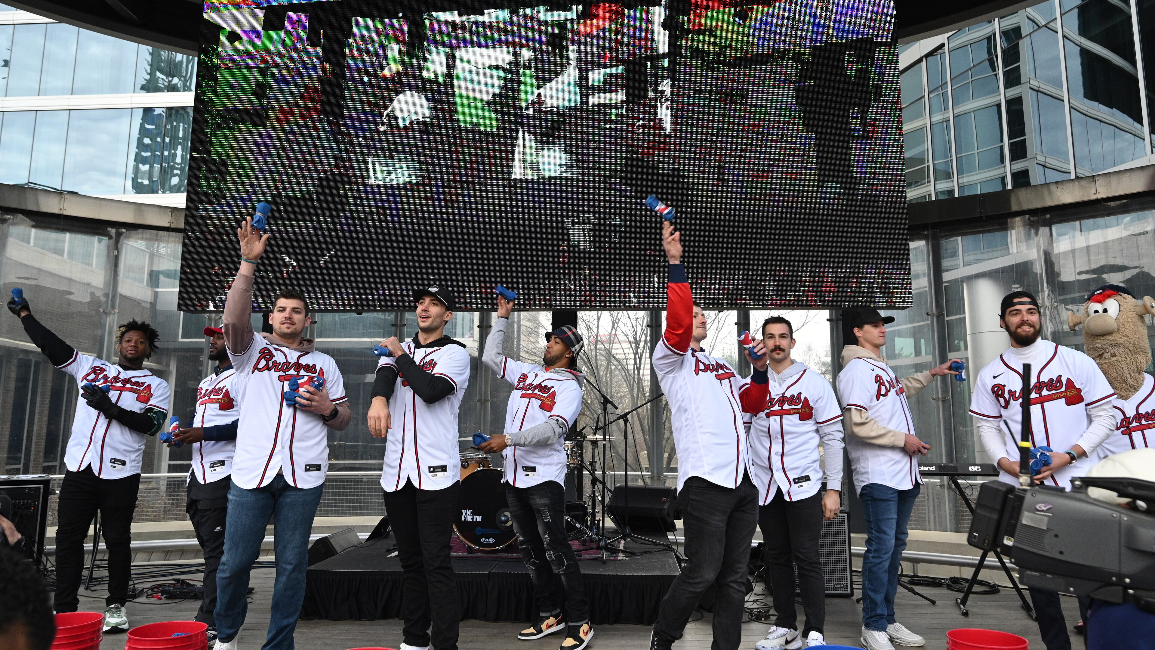 Atlanta Braves’ players throw free T-shirts during Braves Fest at The Battery Atlanta, Saturday, Jan. 21, 2023, in Atlanta. (Hyosub Shin / Hyosub.Shin@ajc.com)