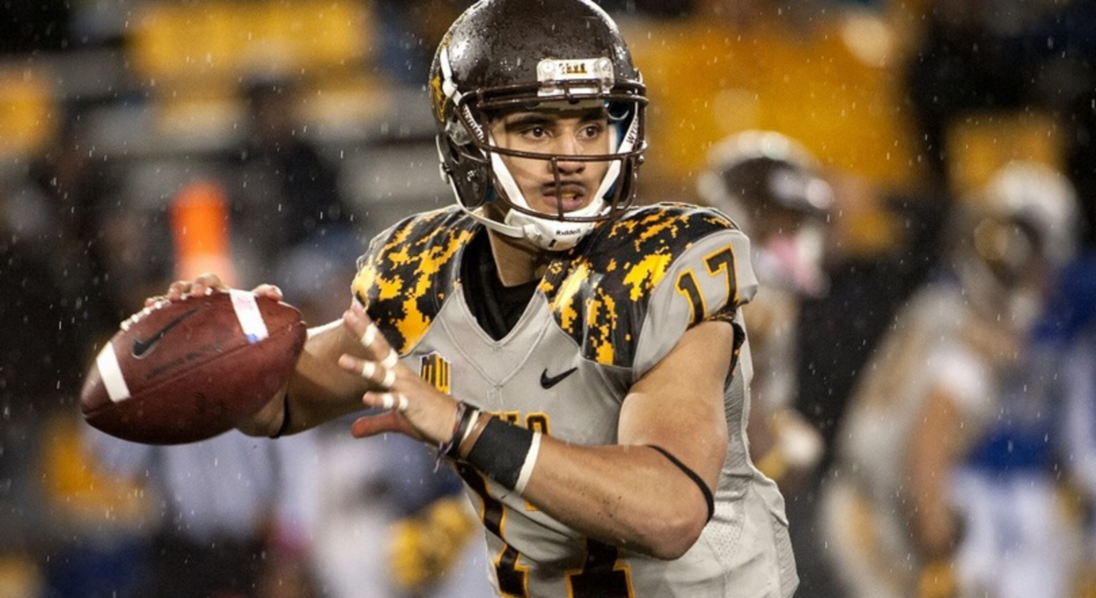 Falcons safety Jason Thompson started his college career as a quarterback at Wyoming. He moved to safety after transferring to Utah. (Photo credit: Wyoming Athletics)