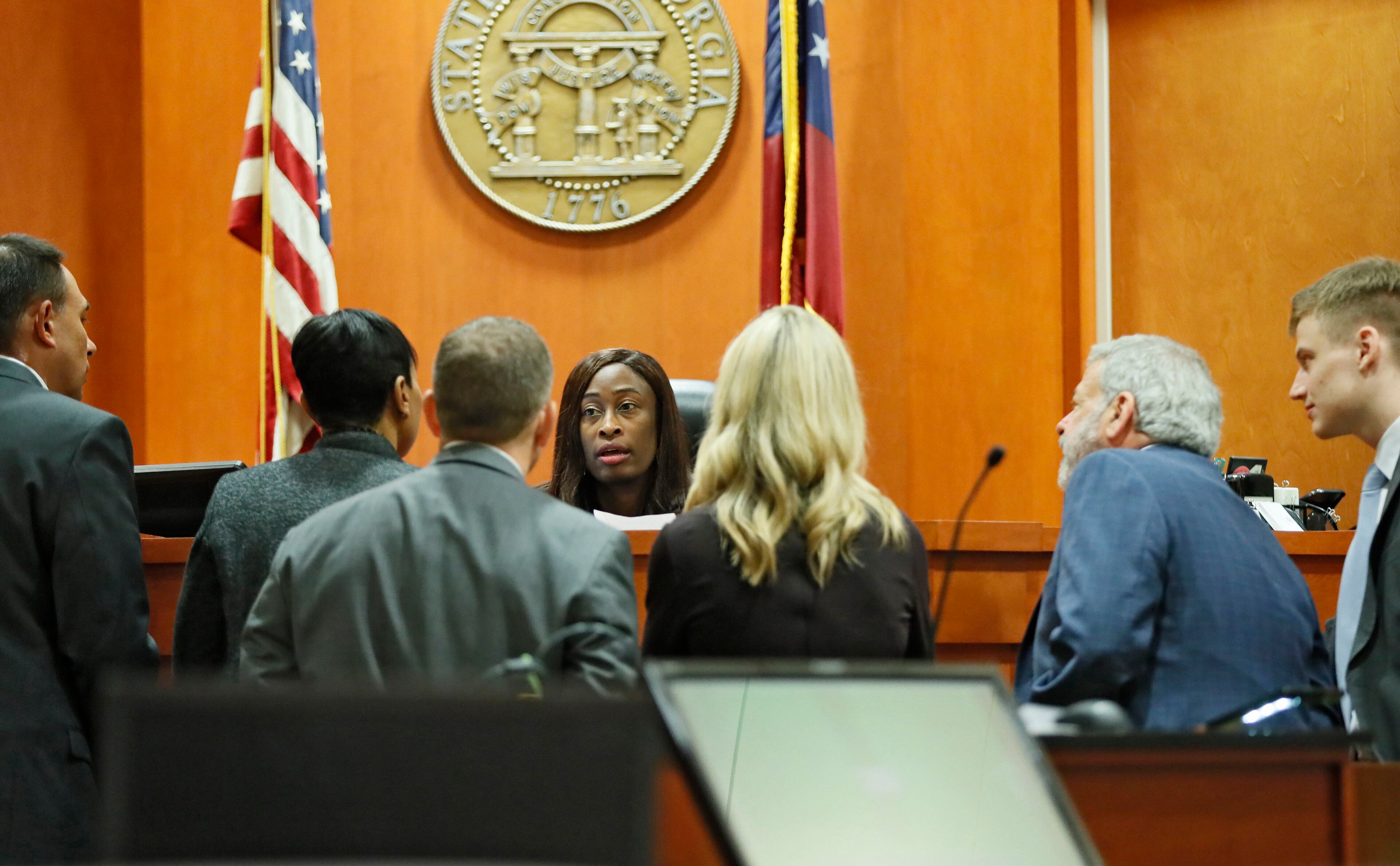 October 11, 2019 - Decatur - Attorneys from both sides huddle around Judge LaTisha Dear Jackson for a bench conference. Jury deliberations in the Robert "Chip" Olsen murder trial entered their fifth day. Bob Andres / robert.andres@ajc.com