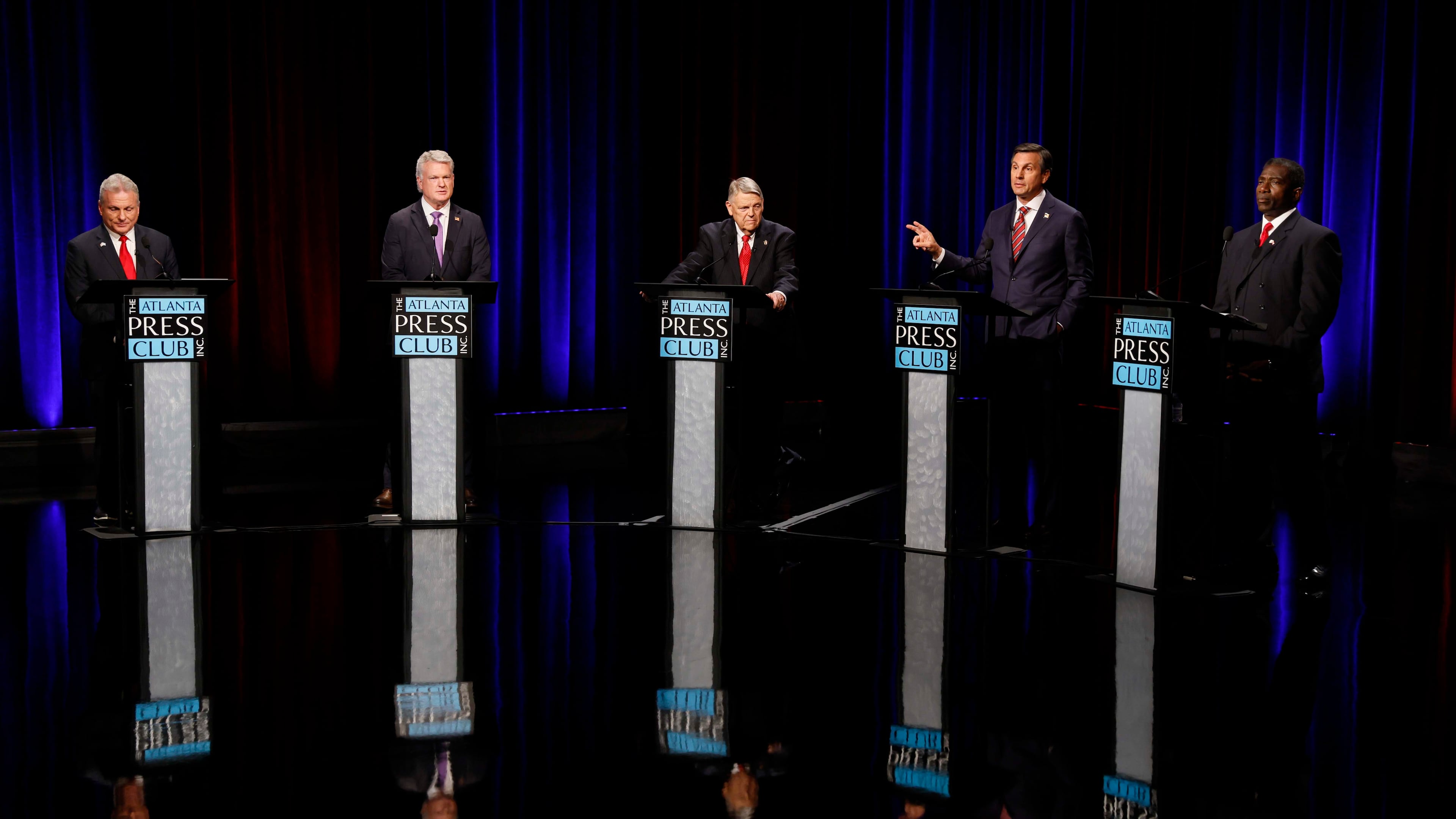 Former football coach Derek Dooley a Republican candidate for the U.S. Senate, second from the right, speaks at the Atlanta Press Club Loudermilk-Young debate for the U.S. Senate at Georgia Public Broadcasting in Midtown on Sunday, April 26, 2026.
(Miguel Martinez/AJC)