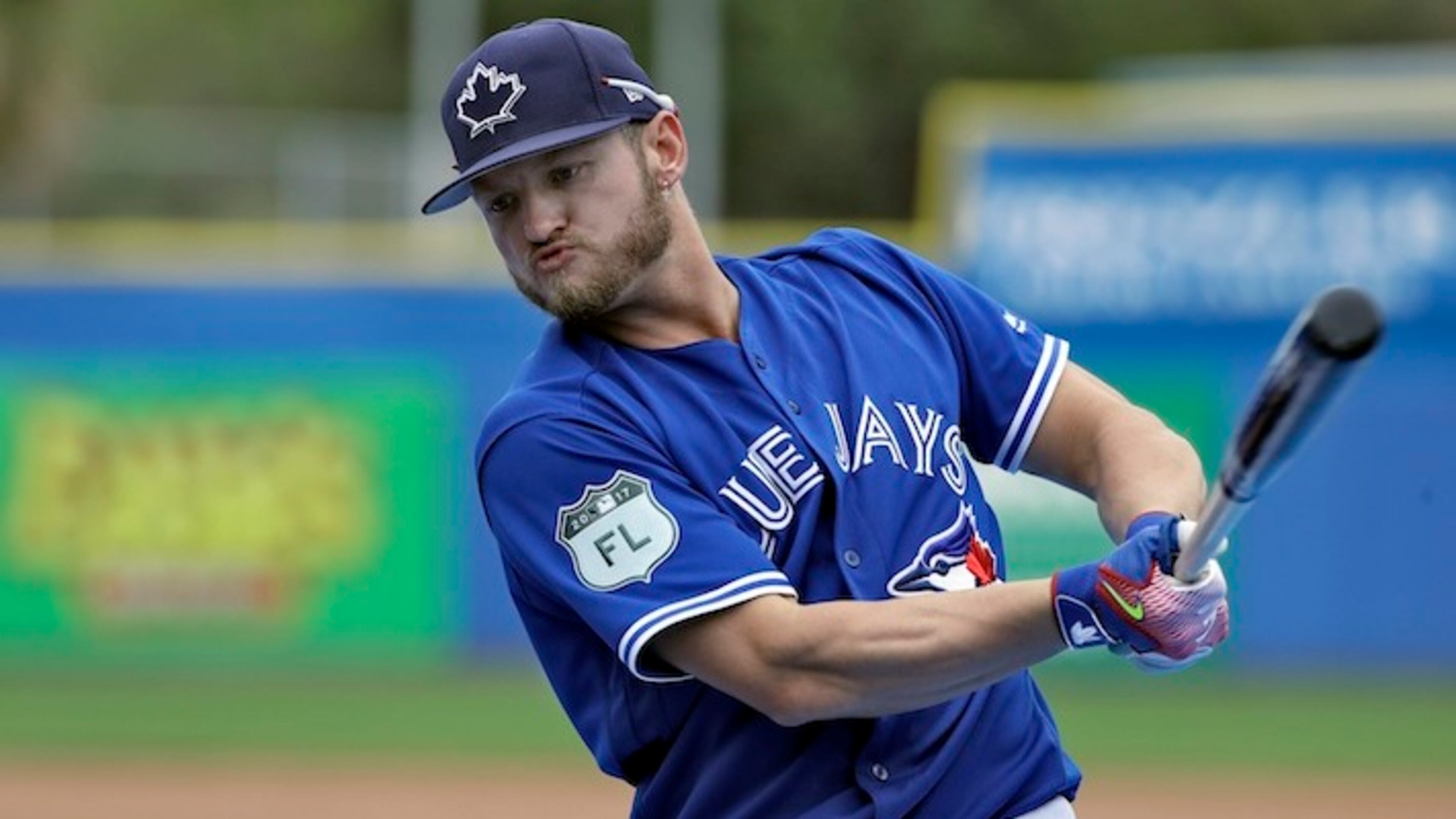 In this March 13, 2017, file photo, Toronto Blue Jays' Josh Donaldson takes practice swings before his turn in the batting cage before a spring training baseball game against the Boston Red Sox, in Dunedin, Fla. Donaldson is an early adopter to a growing big league trend — hitters fixated on producing fly balls. Or, as Donaldson put it recently on Twitter: "Just say NO.... to ground balls." (AP Photo/Chris O'Meara, File)