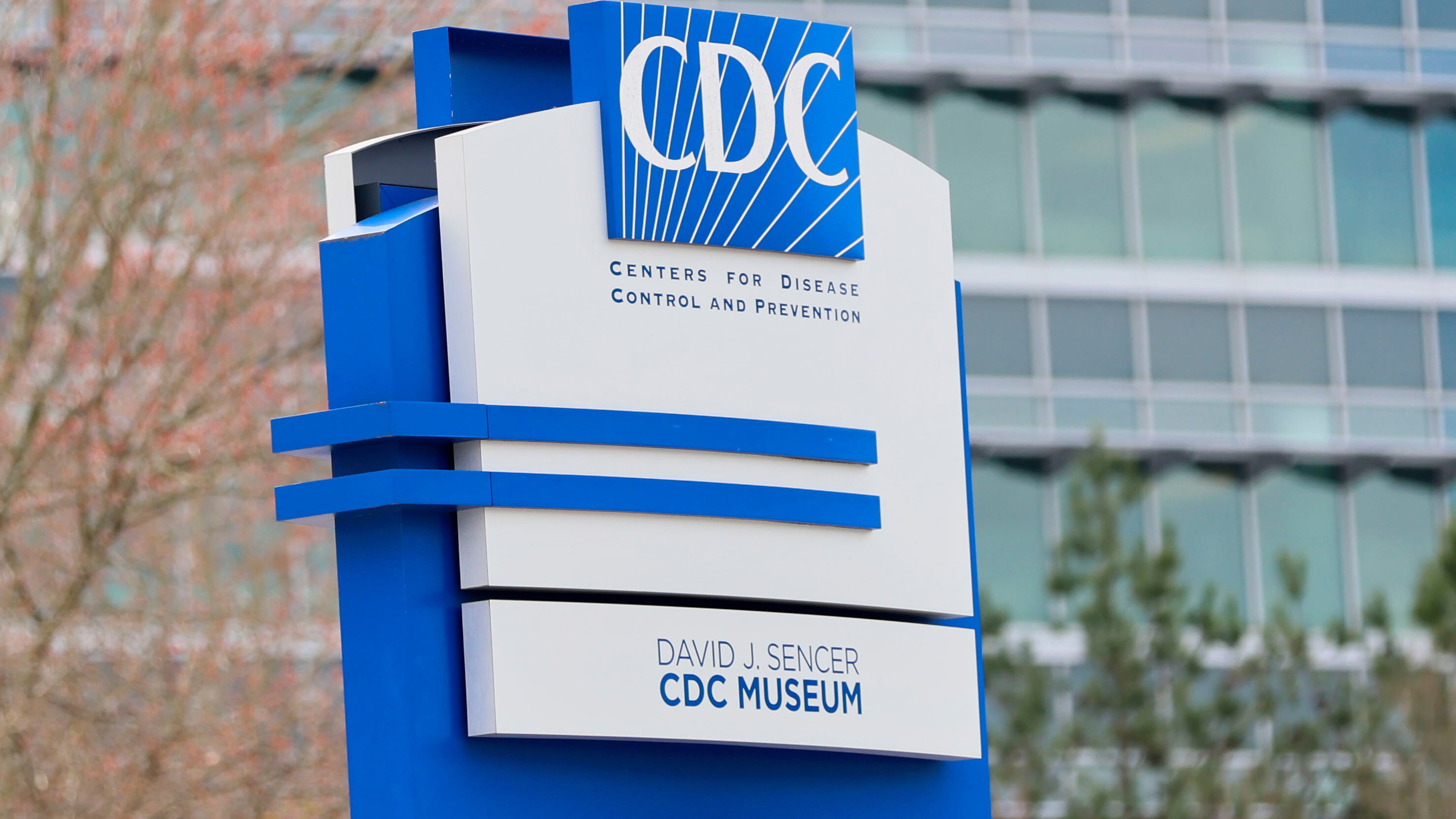 A sign with the CDC logo is displayed at the entrance to the agency's headquarters in Atlanta on March 2, 2025. (Miguel Martinez/AJC file)
